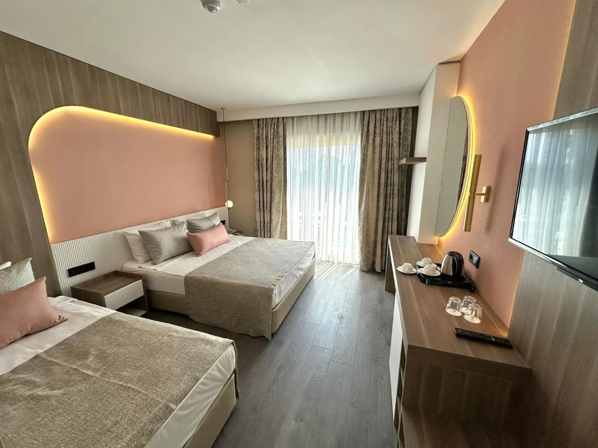 Photo of the whole room, Bed in L'Oceanica Beach Resort Photo of the whole room, Bed in L'Oceanica Beach Resort