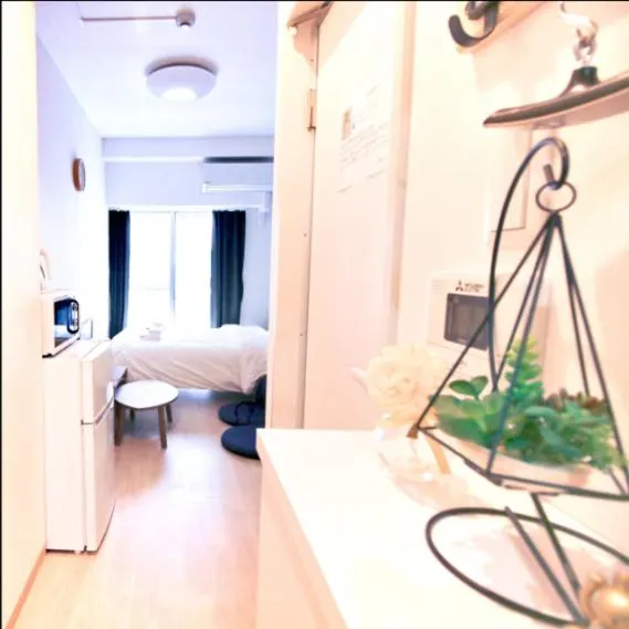 Bed in Uhome Kanda Hotel