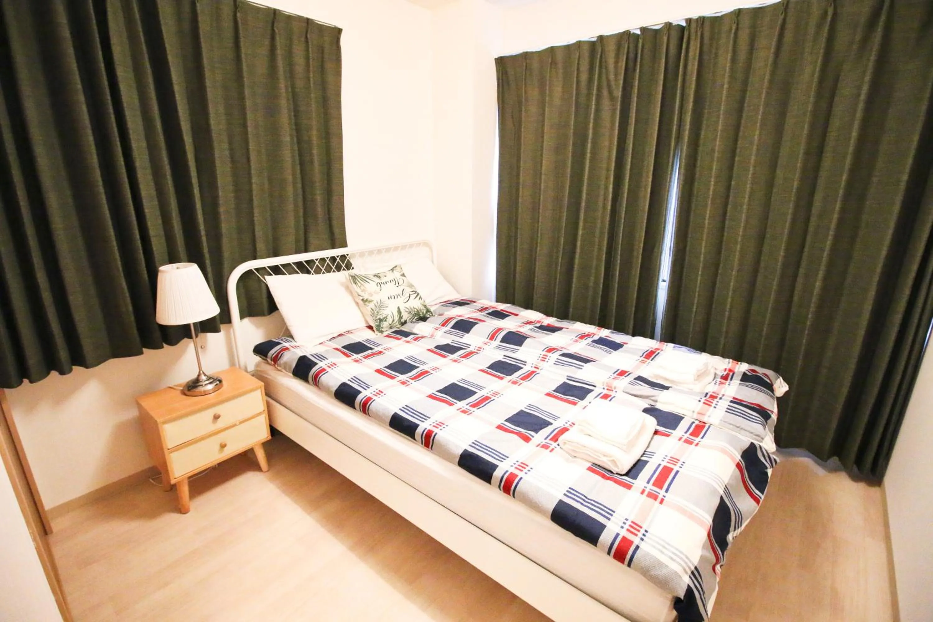 Bed in Uhome Kanda Hotel