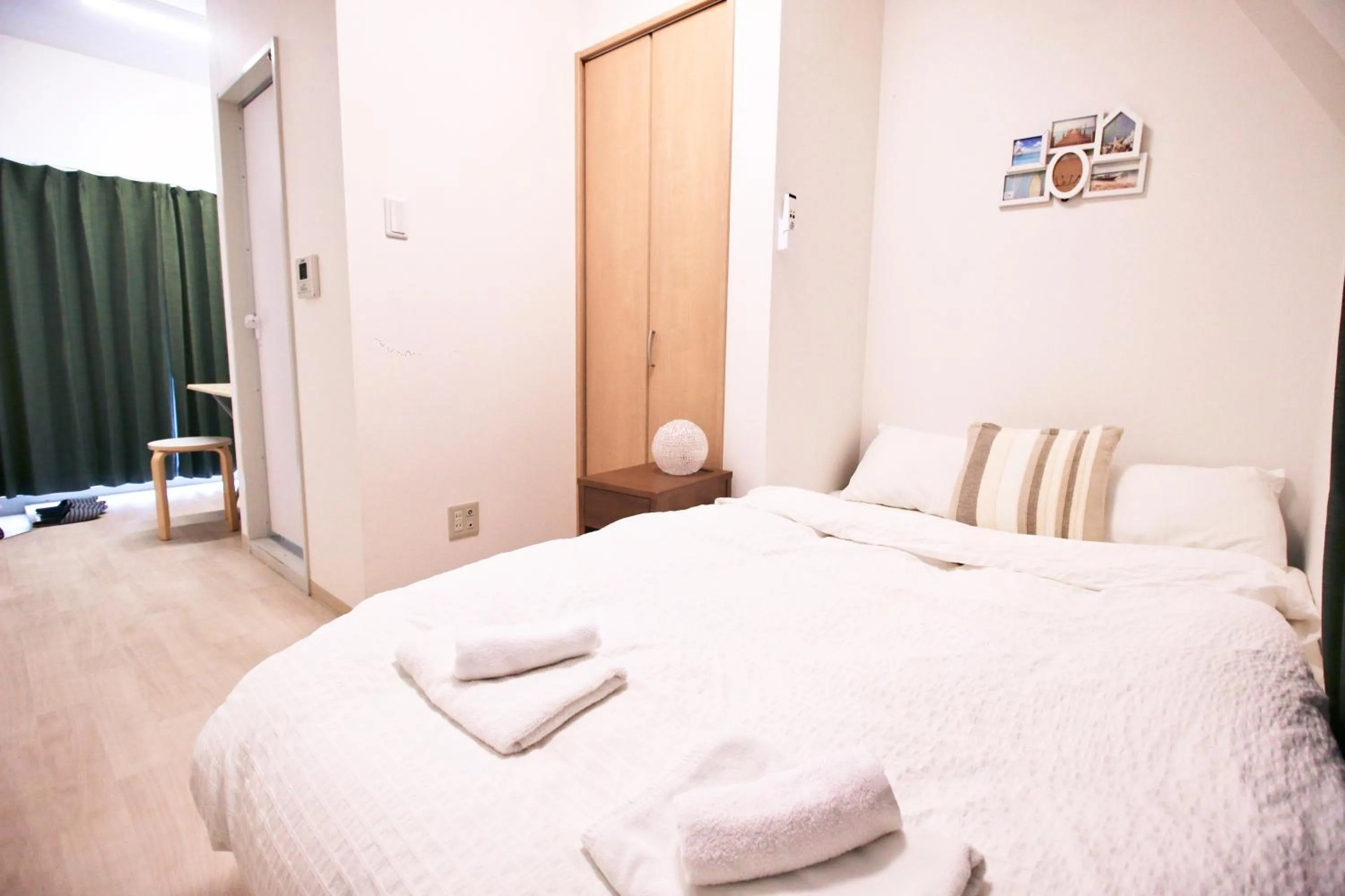 Bed in Uhome Kanda Hotel