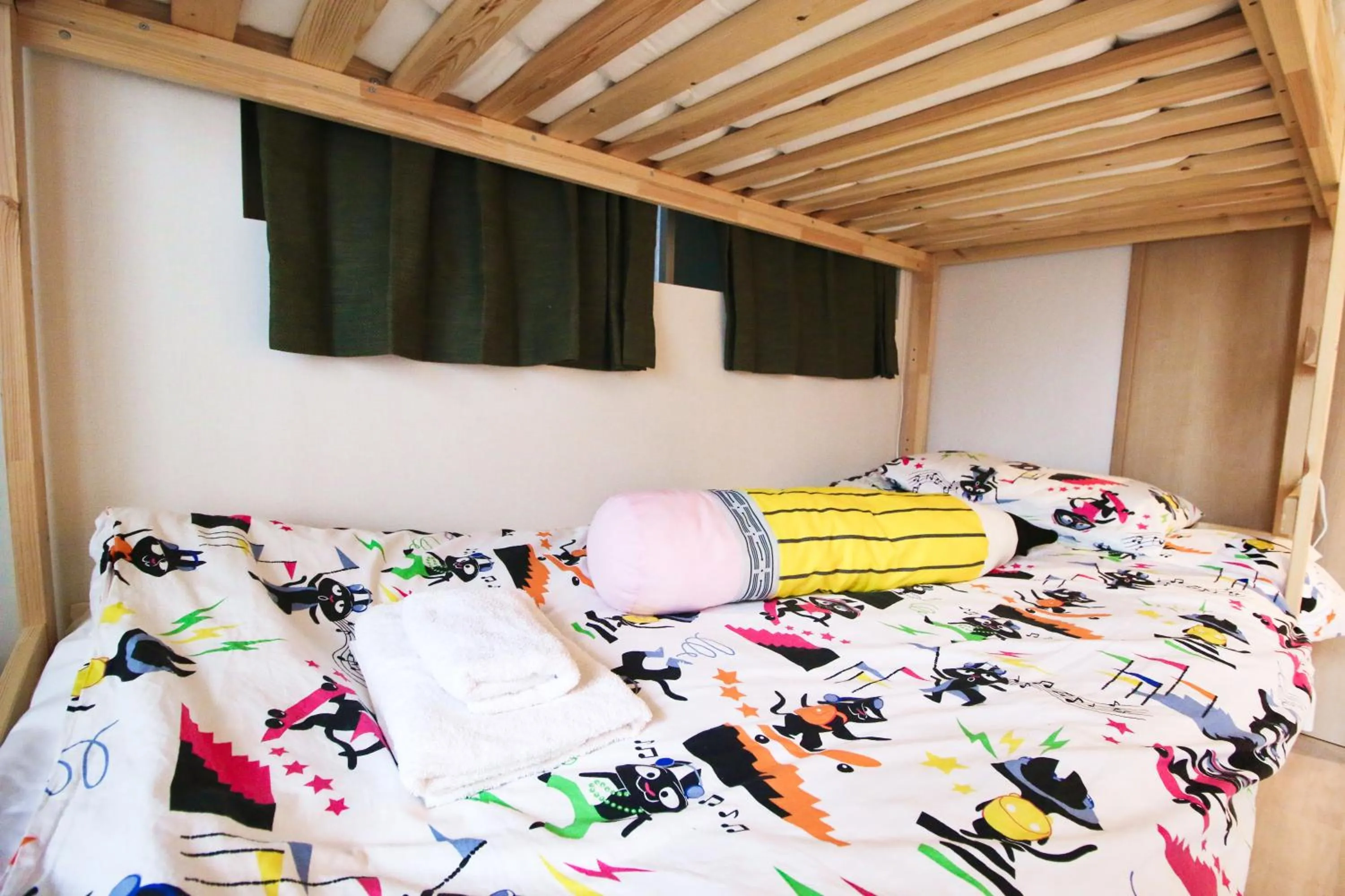 Bed in Uhome Kanda Hotel