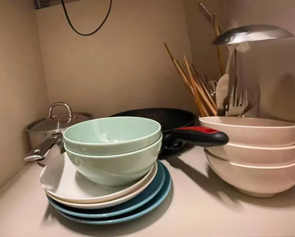 Kitchen or kitchenette in Uhome Kanda Hotel