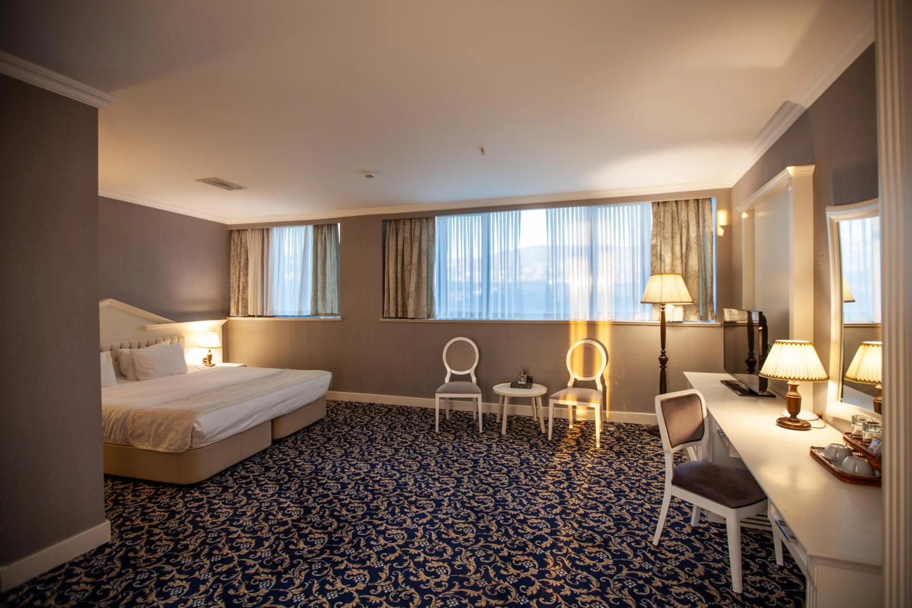 Balcony/Terrace, Bed in Ramada by Wyndham Baku