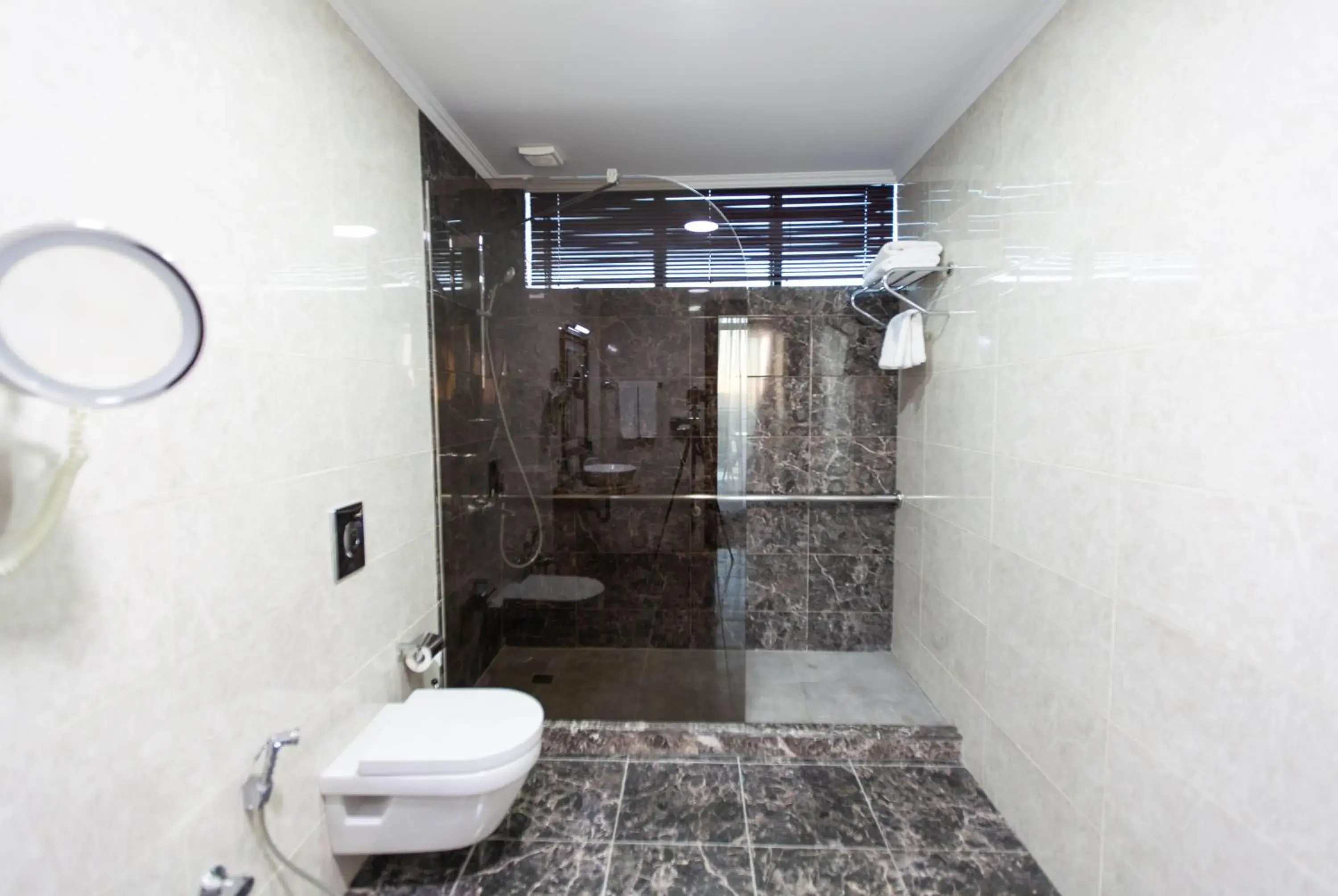 Bathroom in Ramada by Wyndham Baku Bathroom in Ramada by Wyndham Baku