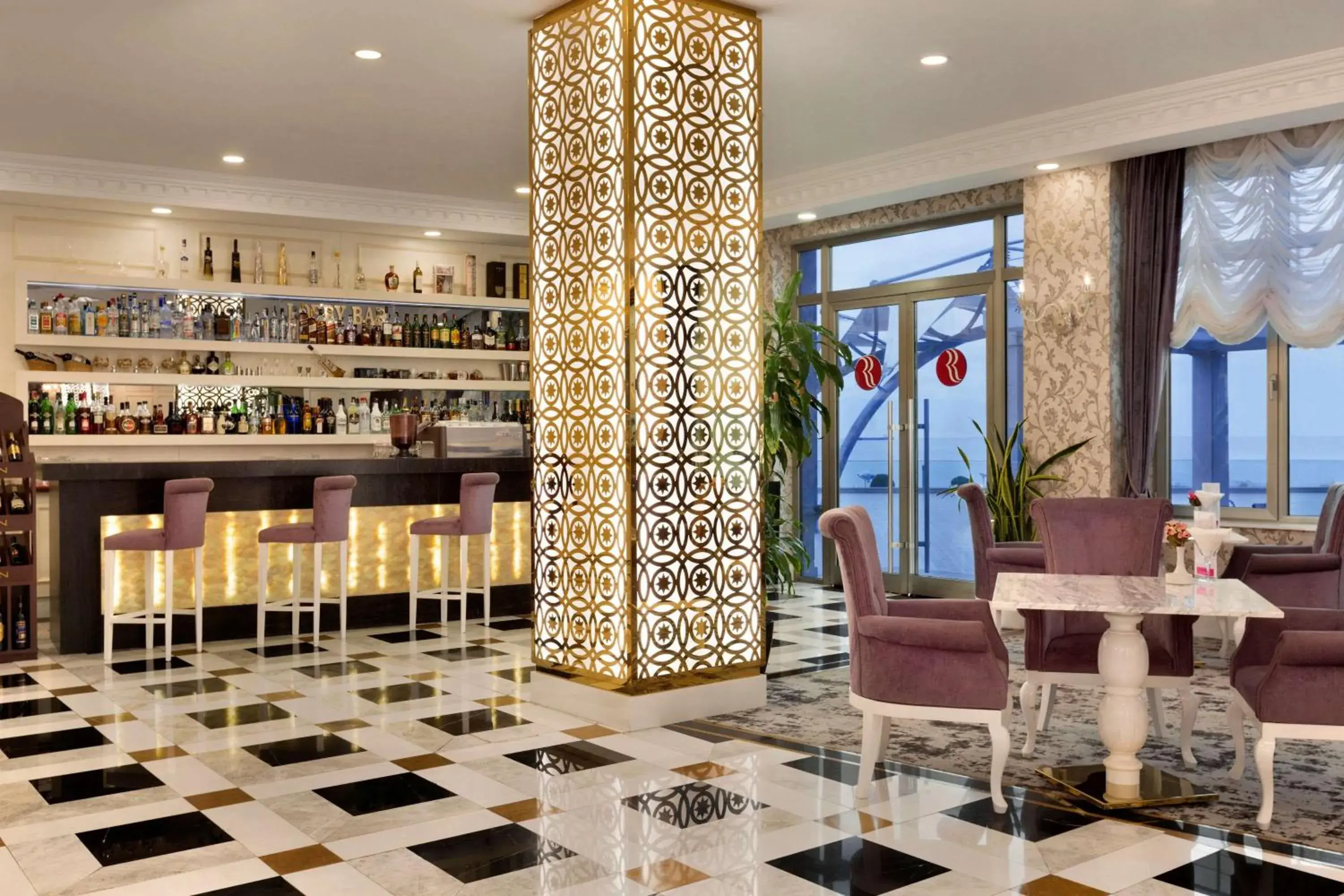 Lounge or bar in Ramada by Wyndham Baku Lounge or bar in Ramada by Wyndham Baku