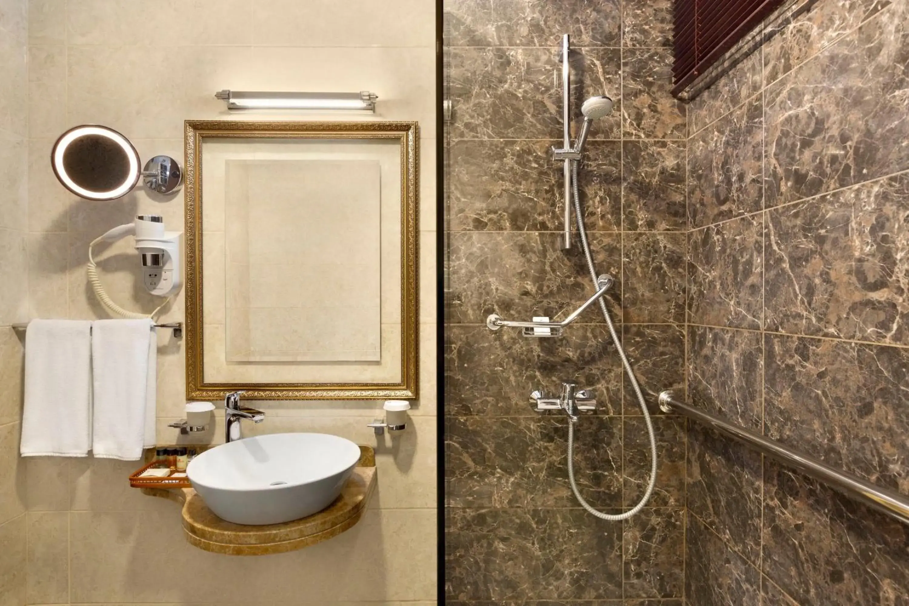 Bathroom in Ramada by Wyndham Baku Bathroom in Ramada by Wyndham Baku