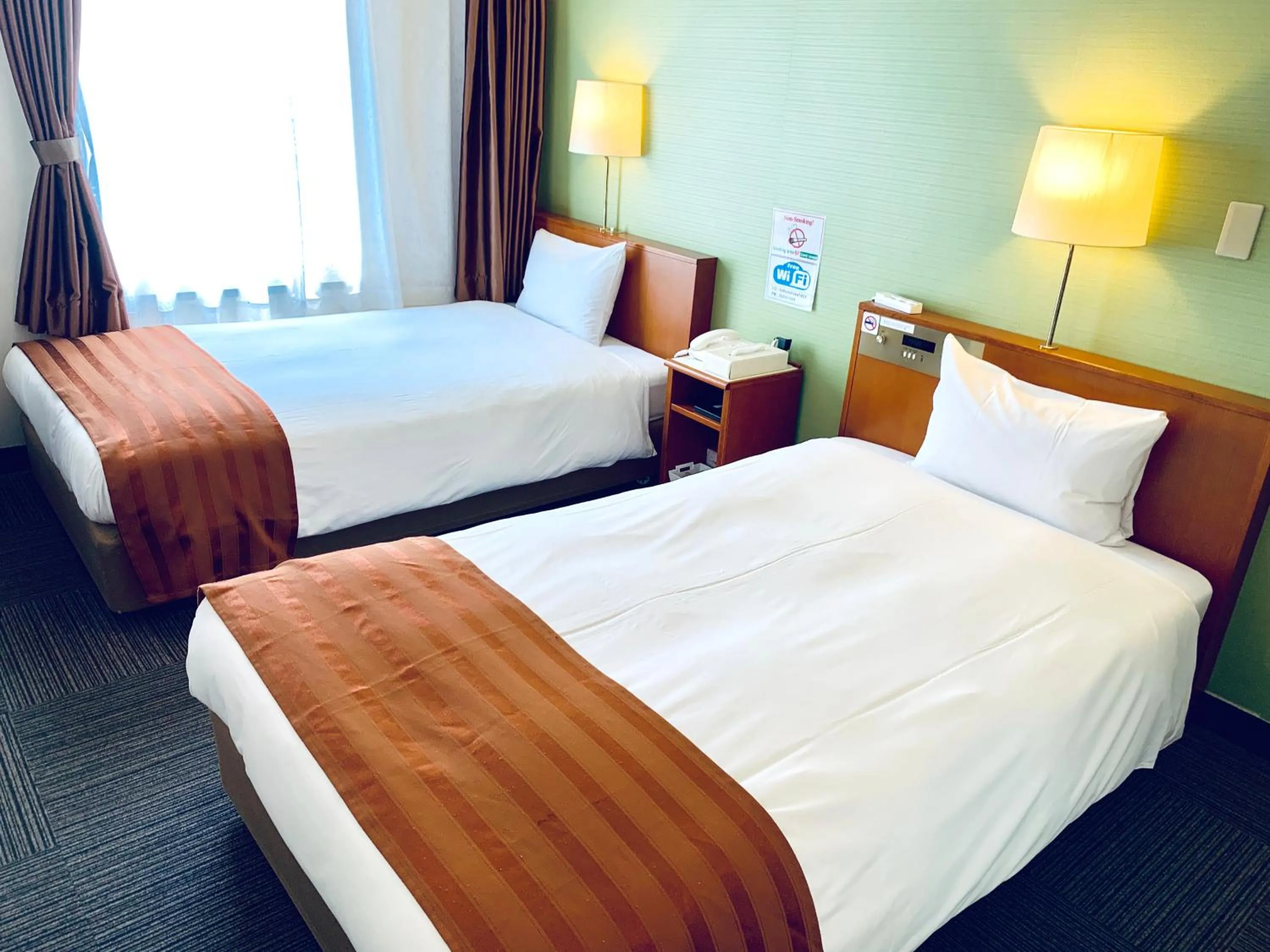 Bed in Tokyo Plaza Hotel