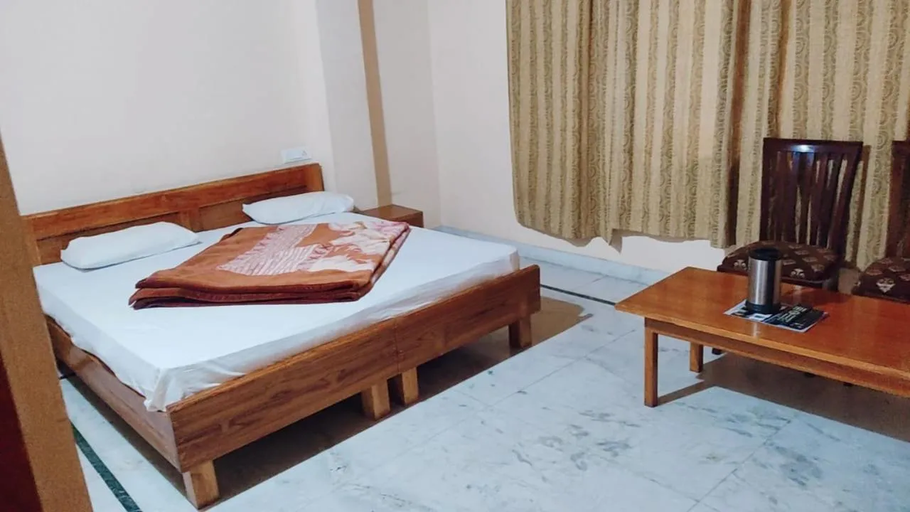 Bed in Hotel Atul Regency