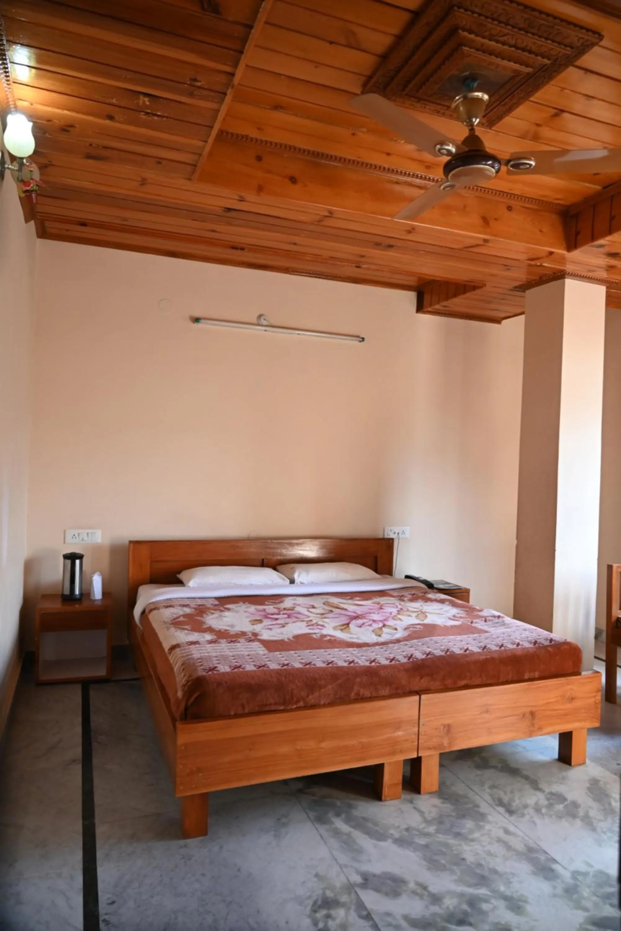 Bed in Hotel Atul Regency