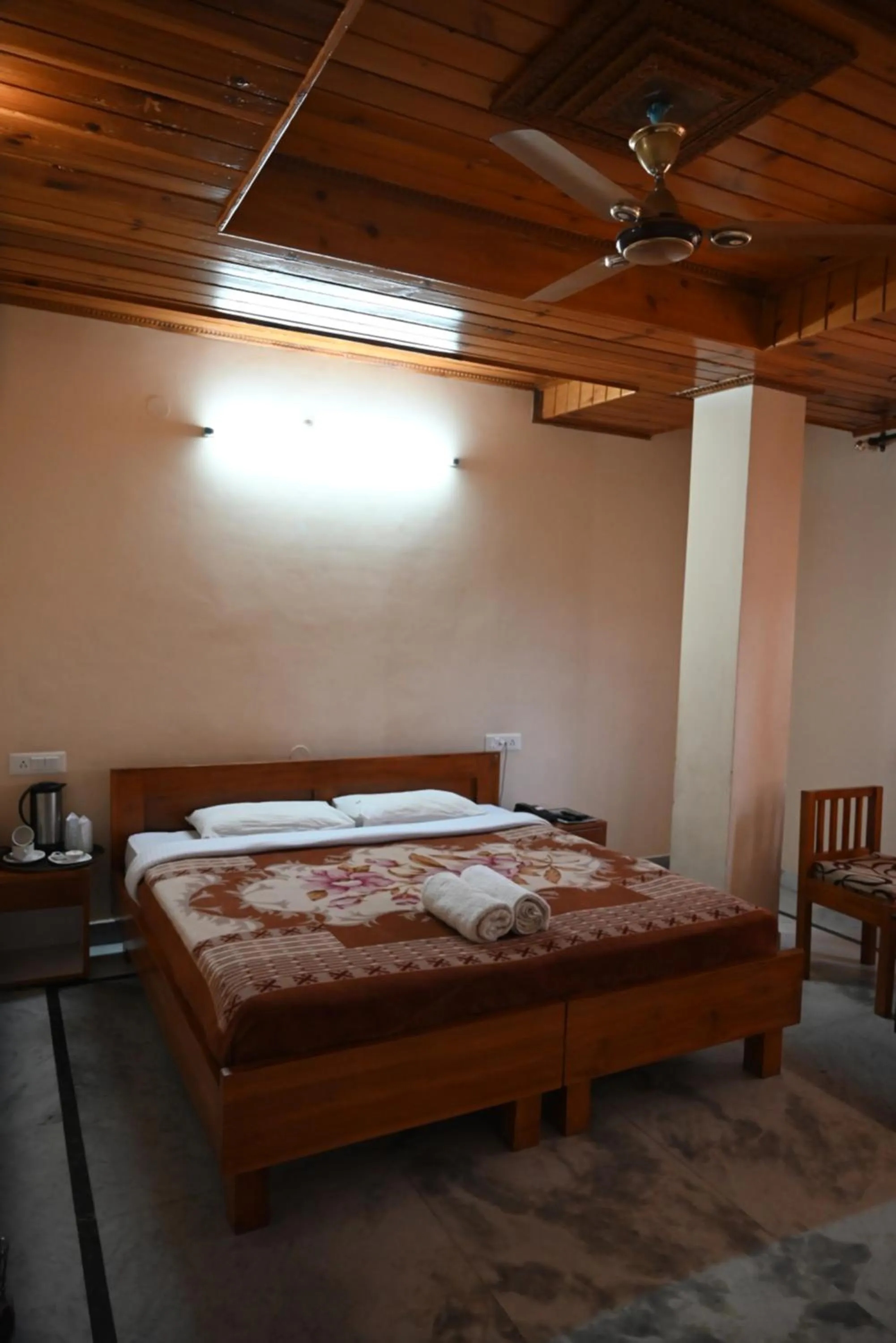 Bed in Hotel Atul Regency