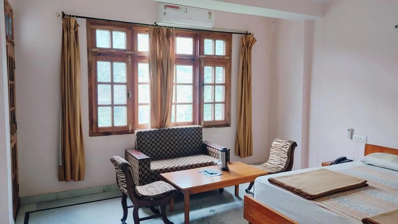 Bed in Hotel Atul Regency