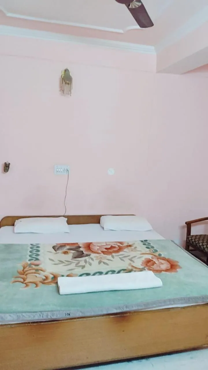 Bed in Hotel Atul Regency