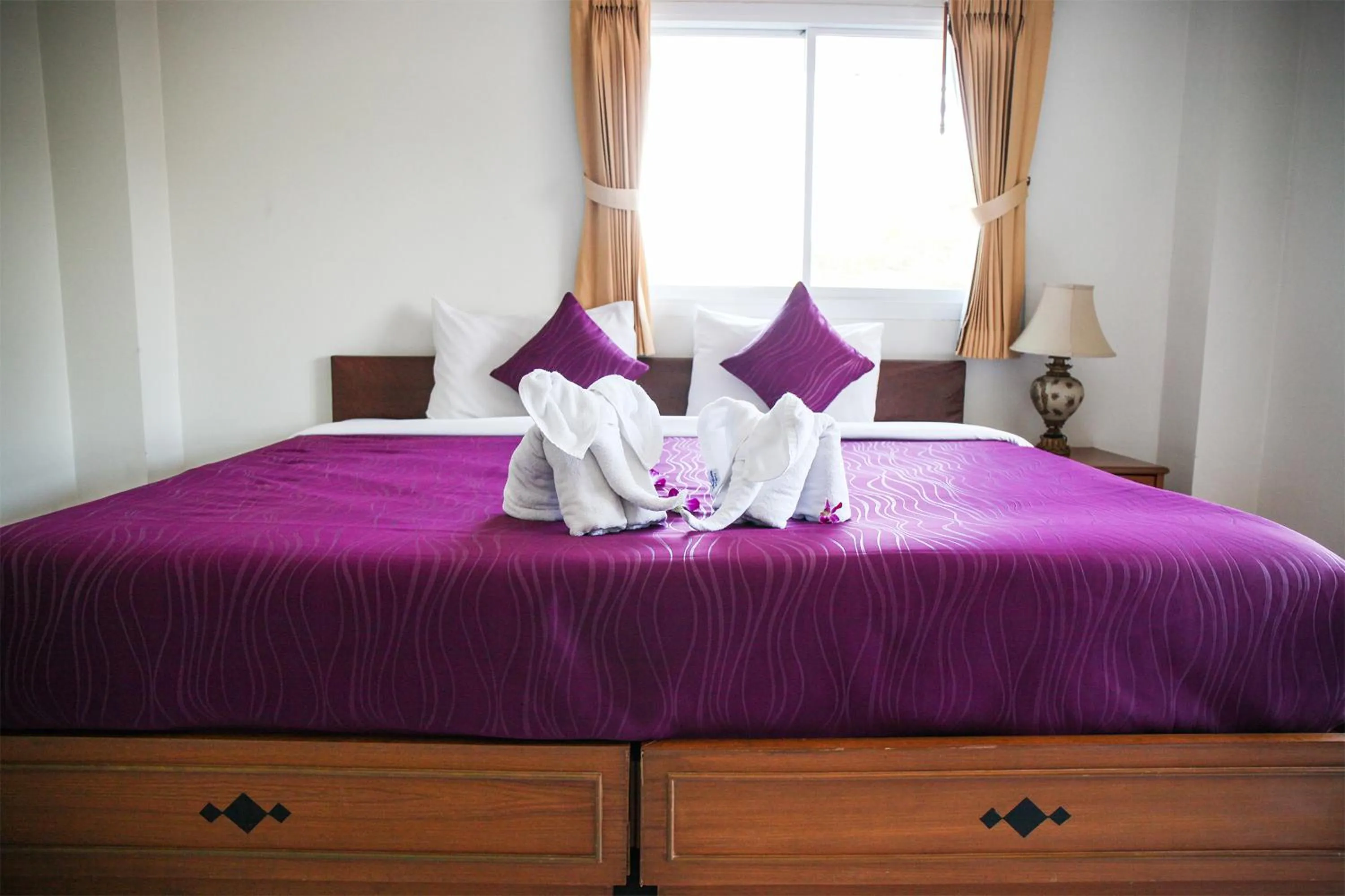 Bed in Hua Hin White Villa Hotel - SHA Certified