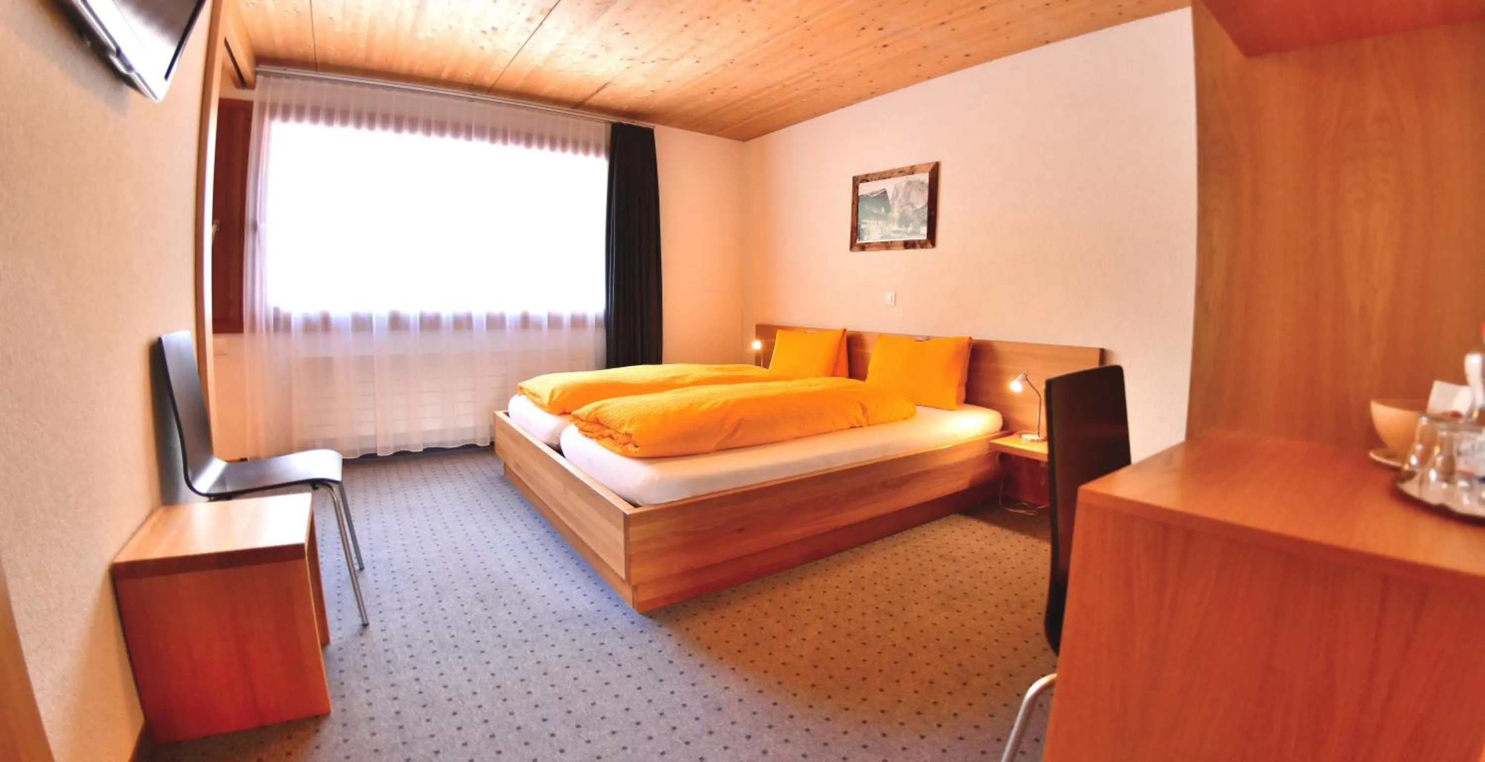 Photo of the whole room, Bed in Hotel Wetterhorn