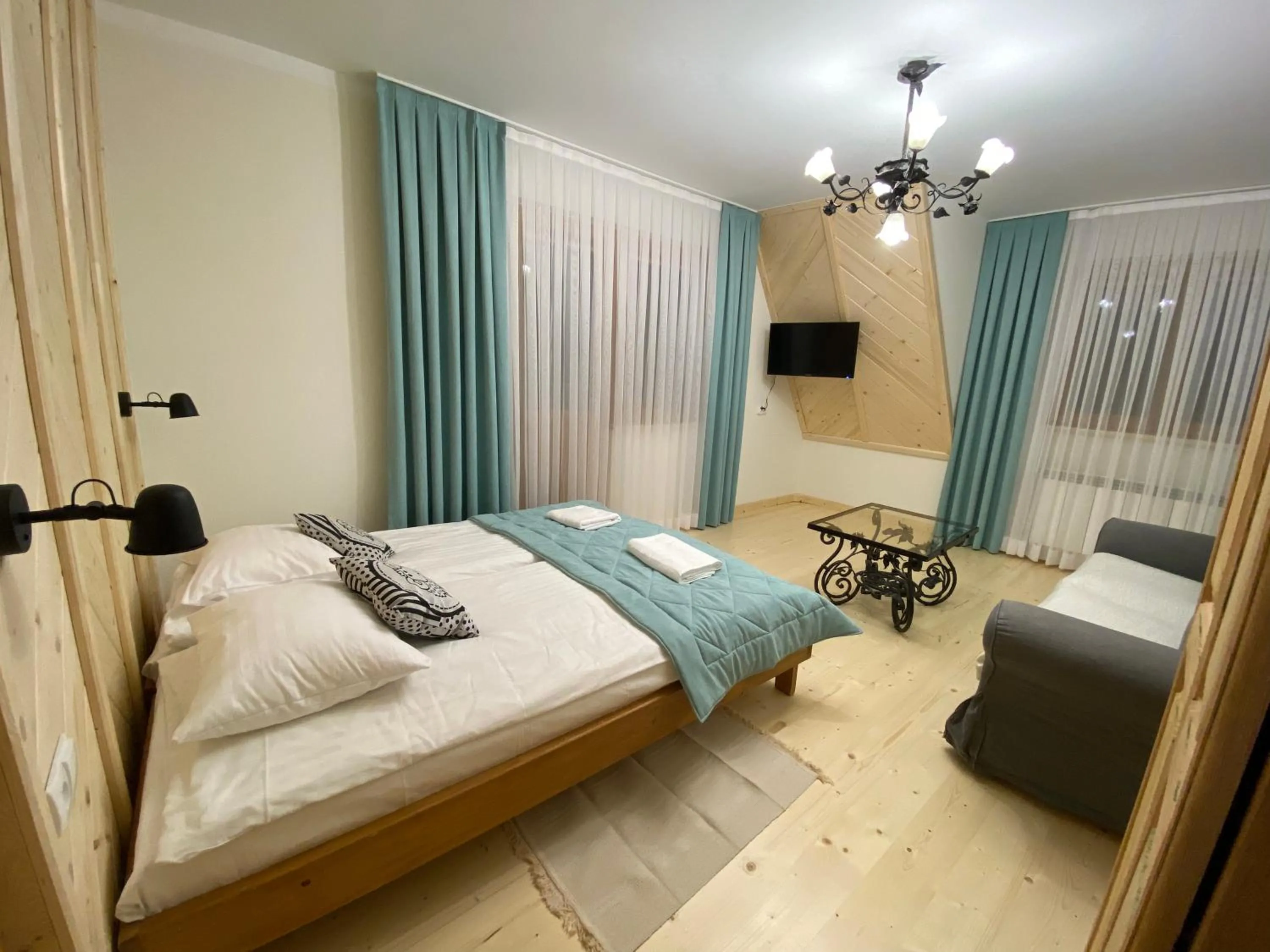 Communal lounge/ TV room, Bed in Moje Tatry Gluten Free