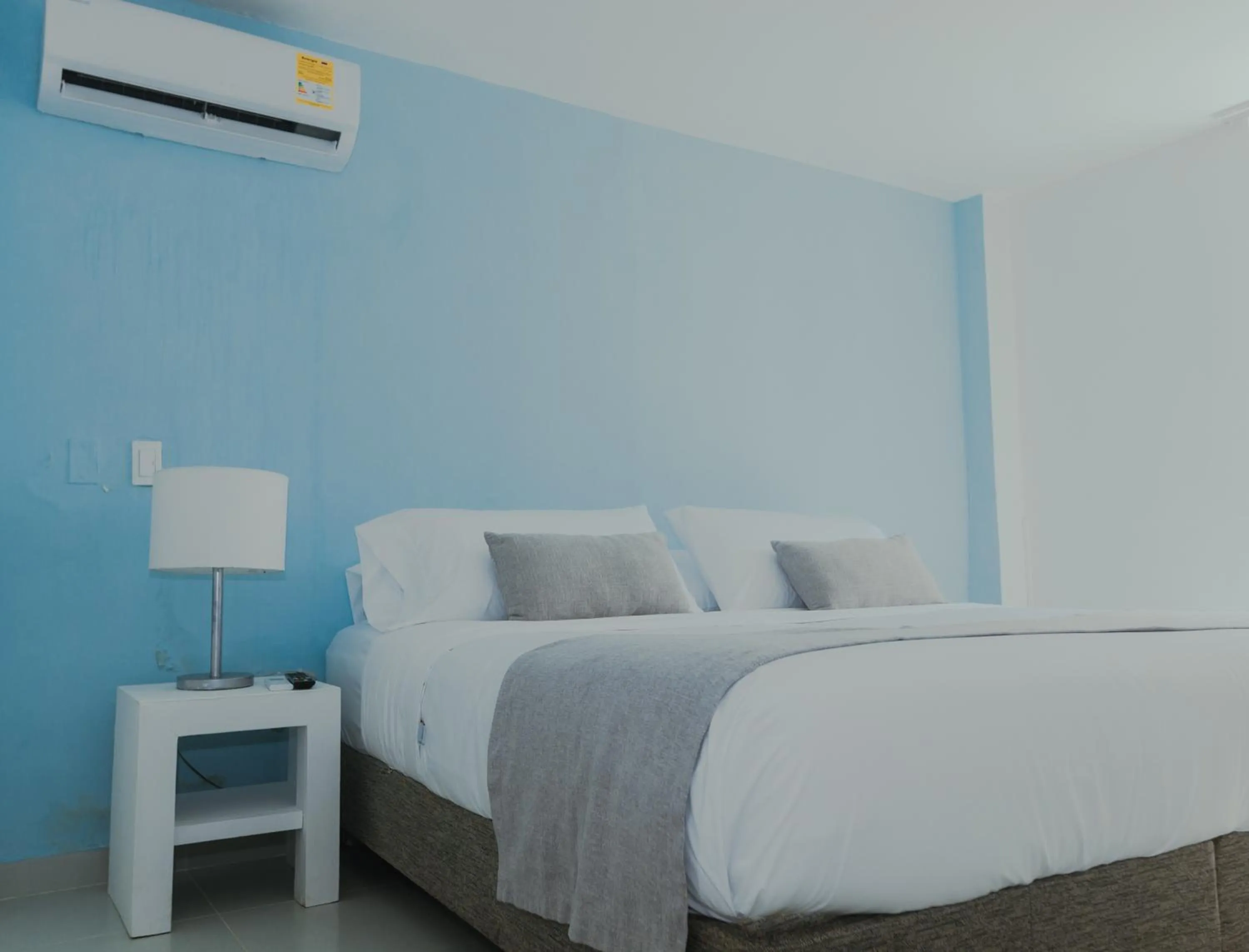 Bed in Hotel San Luis Beach House By OxoHotel