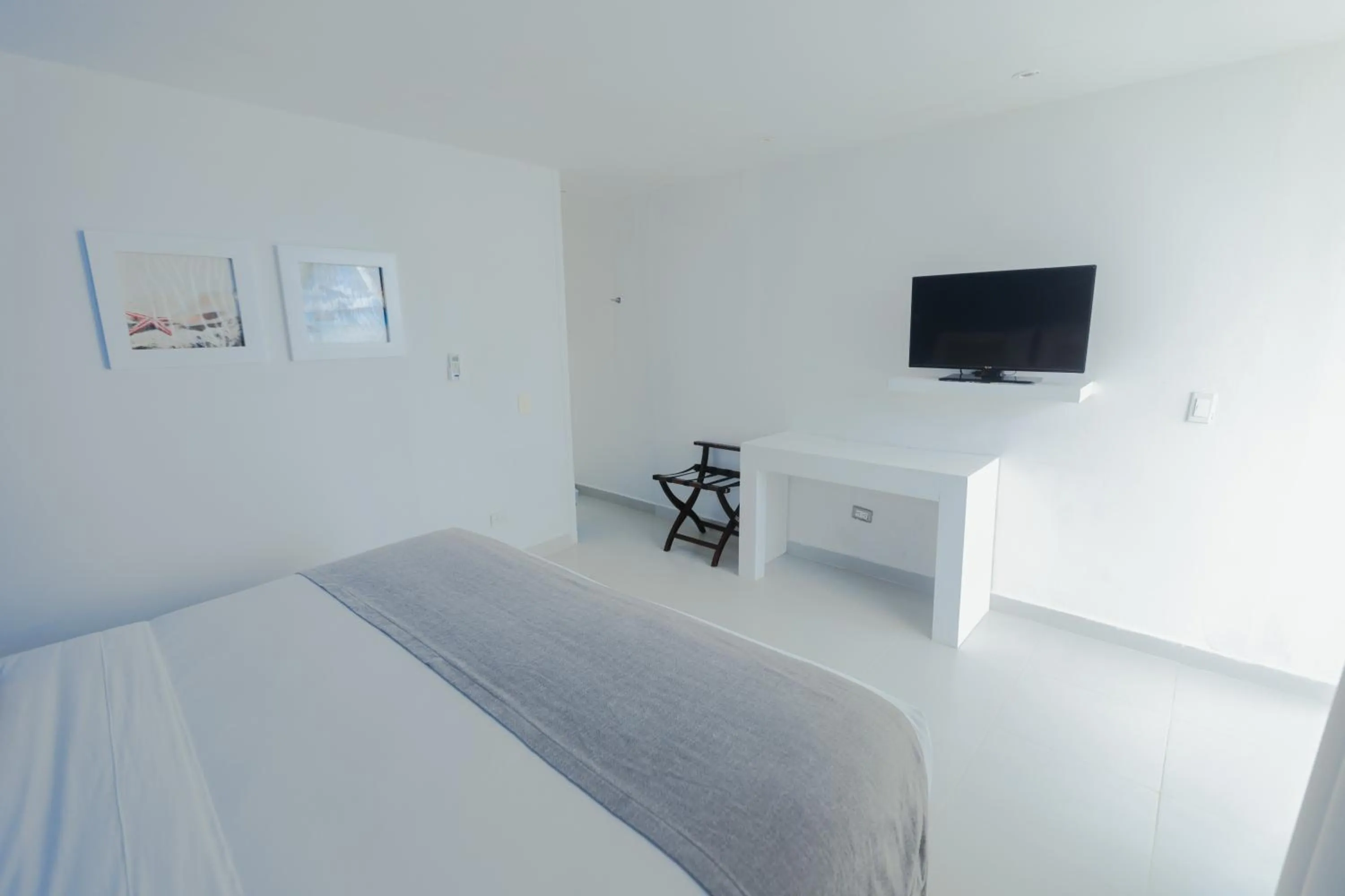 Photo of the whole room, Bed in Hotel San Luis Beach House By OxoHotel