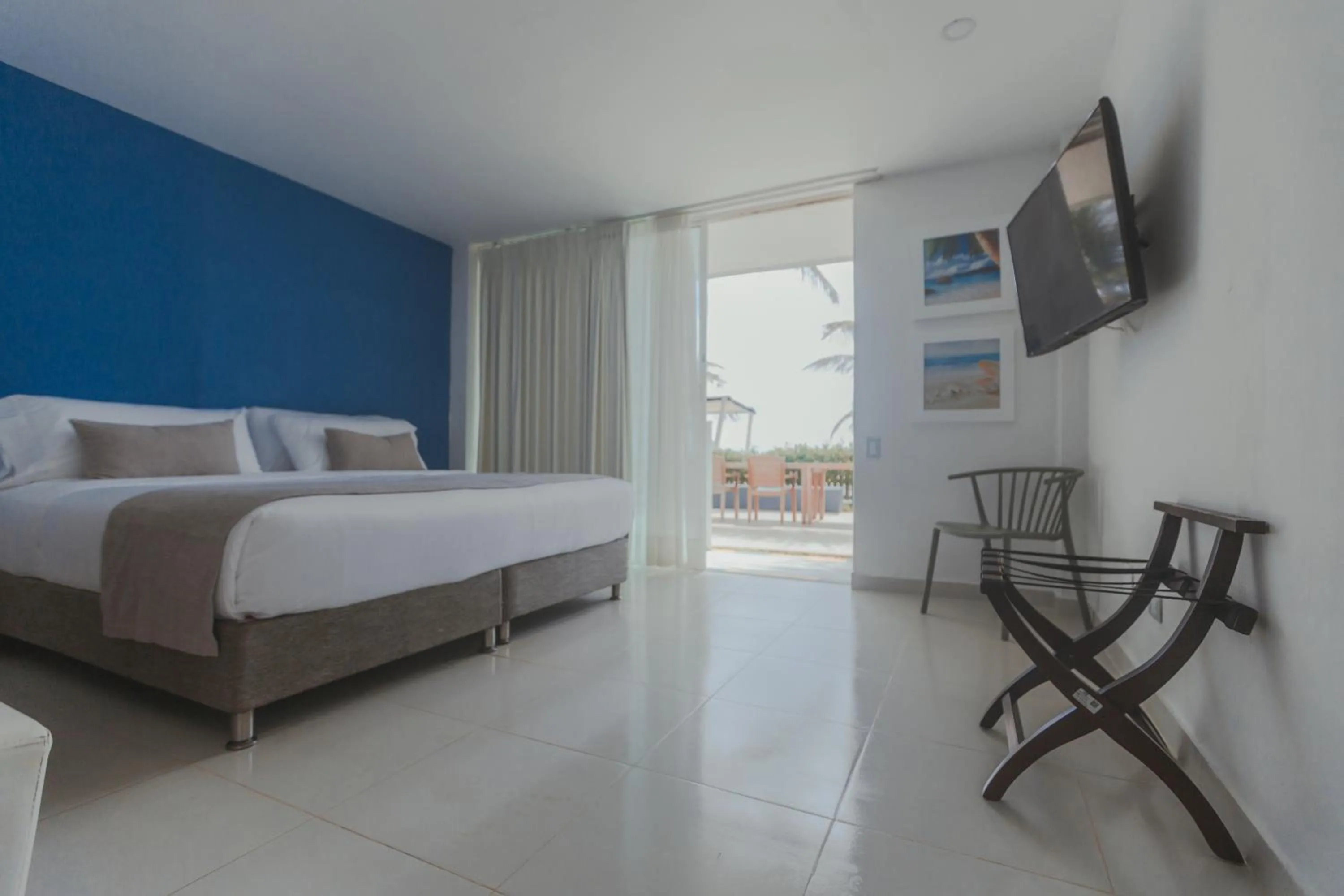 Photo of the whole room, Bed in Hotel San Luis Beach House By OxoHotel