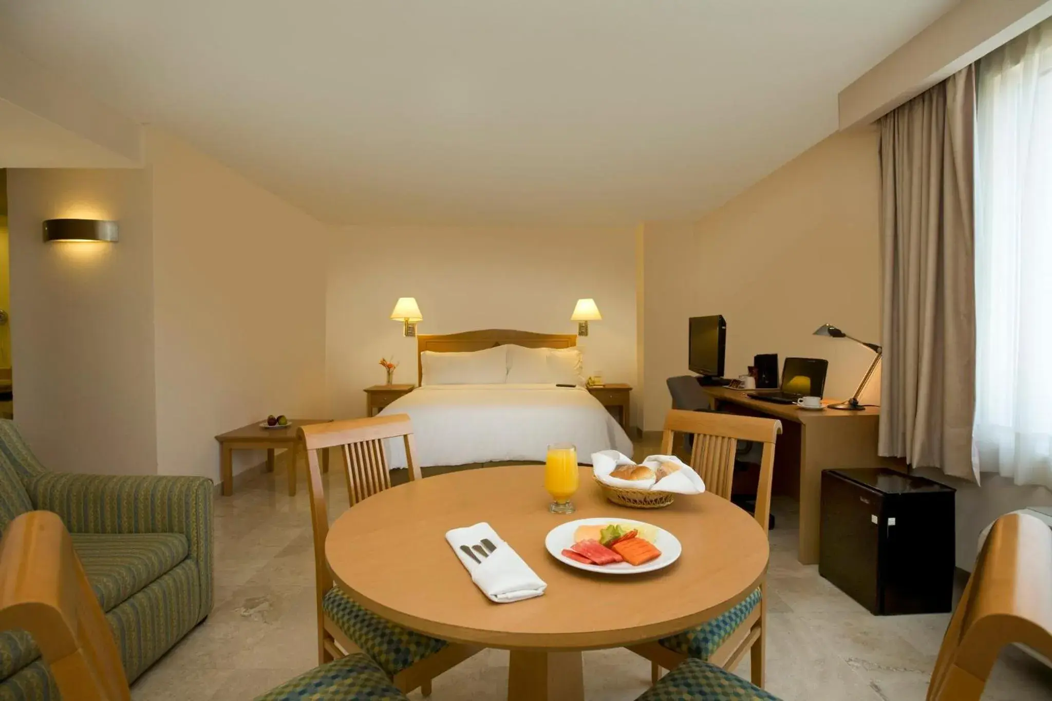 Photo of the whole room, Bed in Fiesta Inn Ciudad del Carmen Photo of the whole room, Bed in Fiesta Inn Ciudad del Carmen