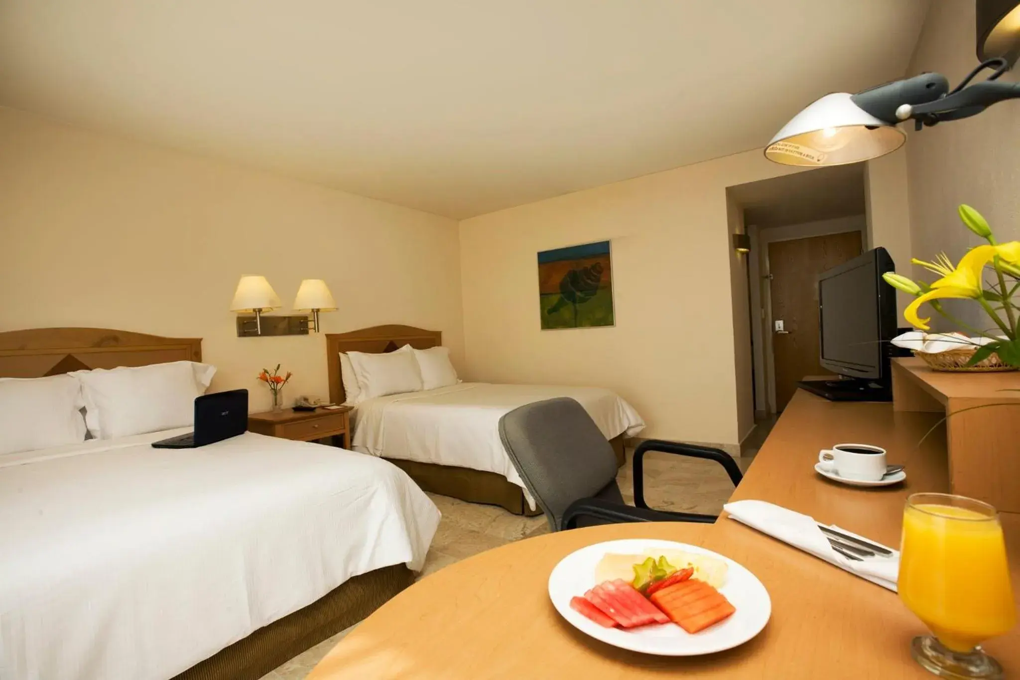 Photo of the whole room, Bed in Fiesta Inn Ciudad del Carmen Photo of the whole room, Bed in Fiesta Inn Ciudad del Carmen