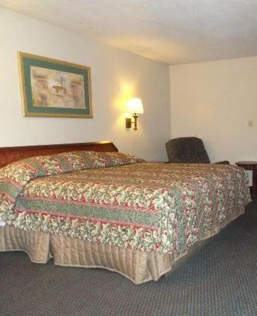 Bed in Red Carpet Inn (formerly Royal Inn)