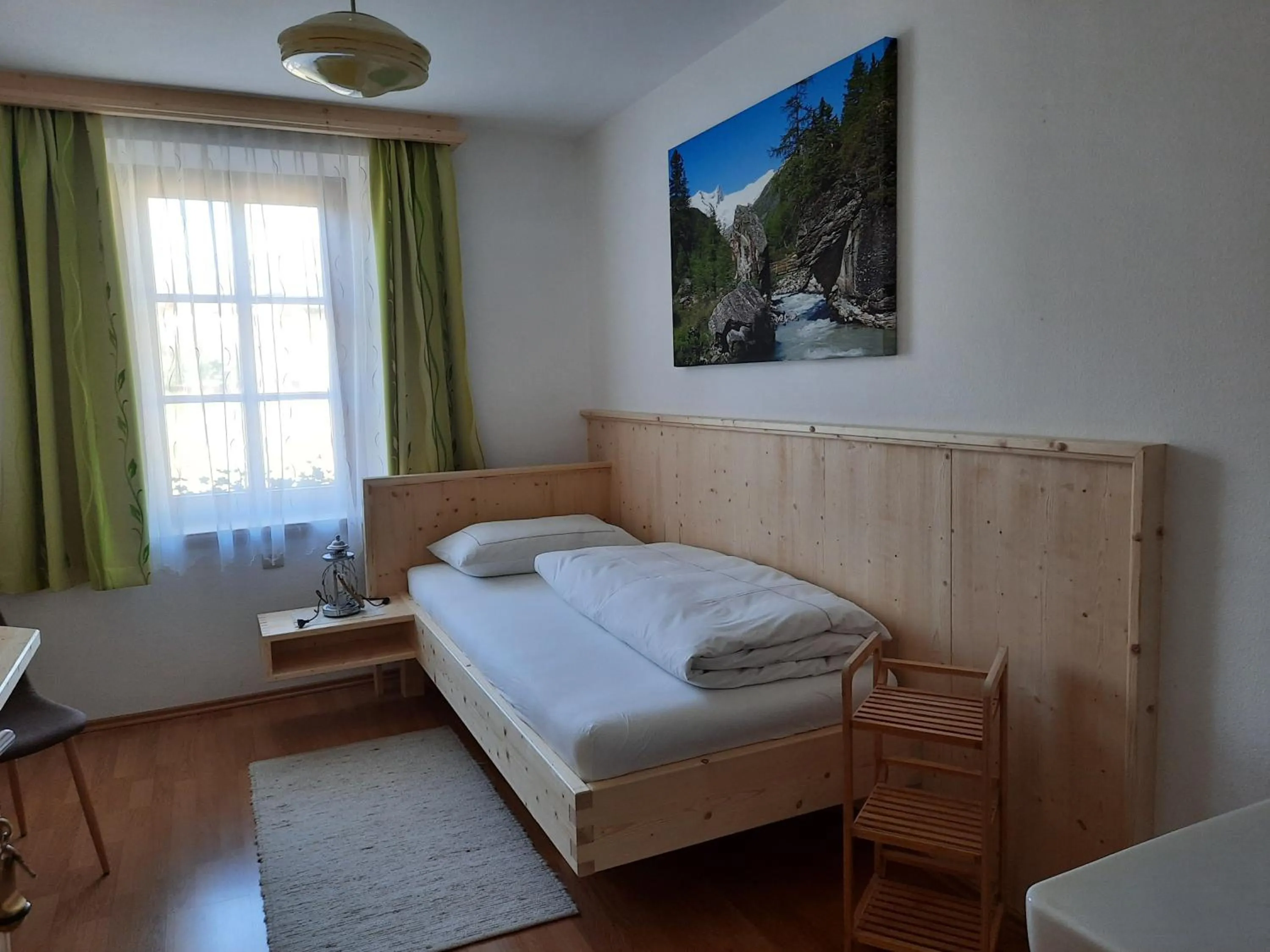 Photo of the whole room, Bed in Gästehaus Taner
