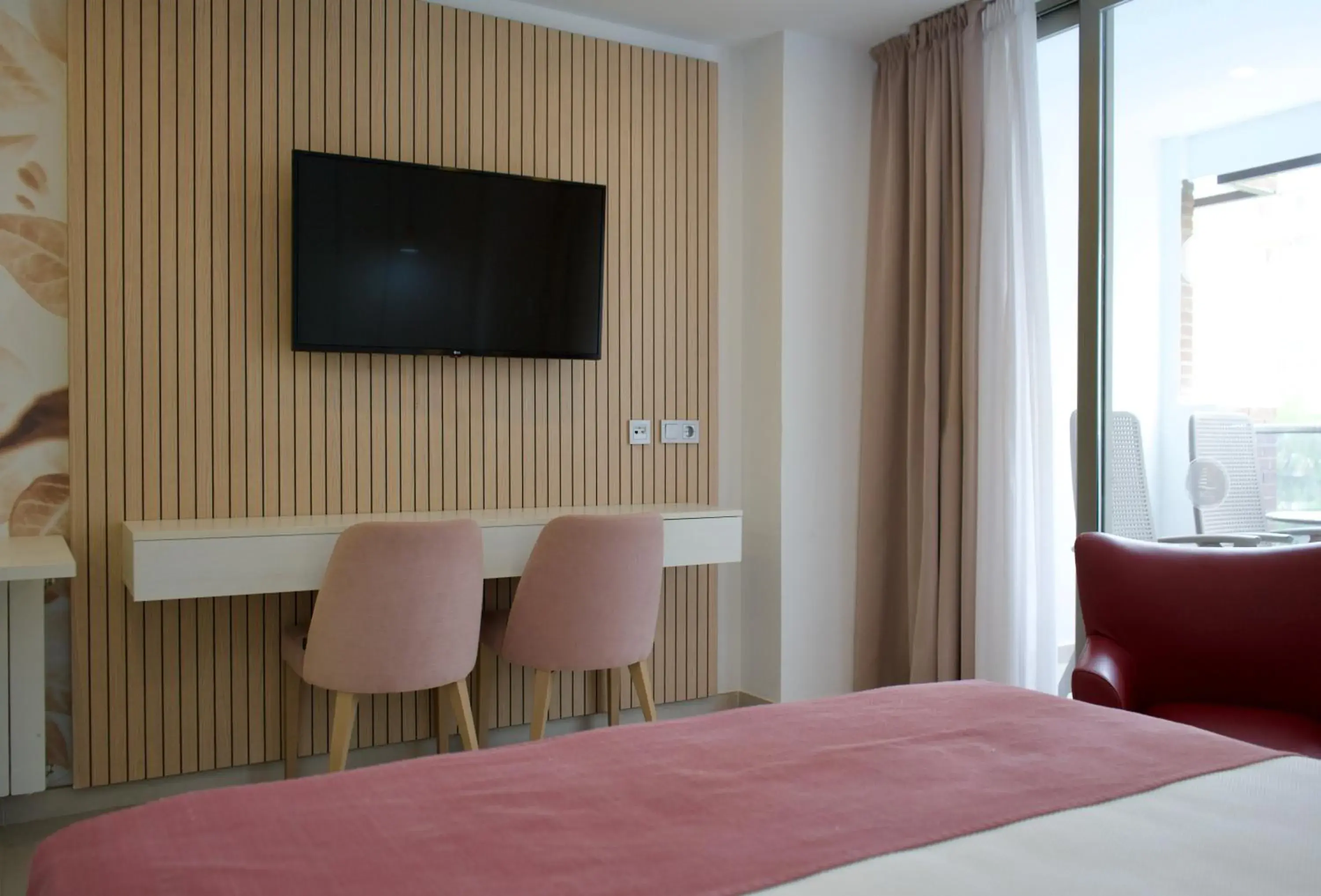 Living room, Bed in Aparthotel BCL Levante Beach Living room, Bed in Aparthotel BCL Levante Beach