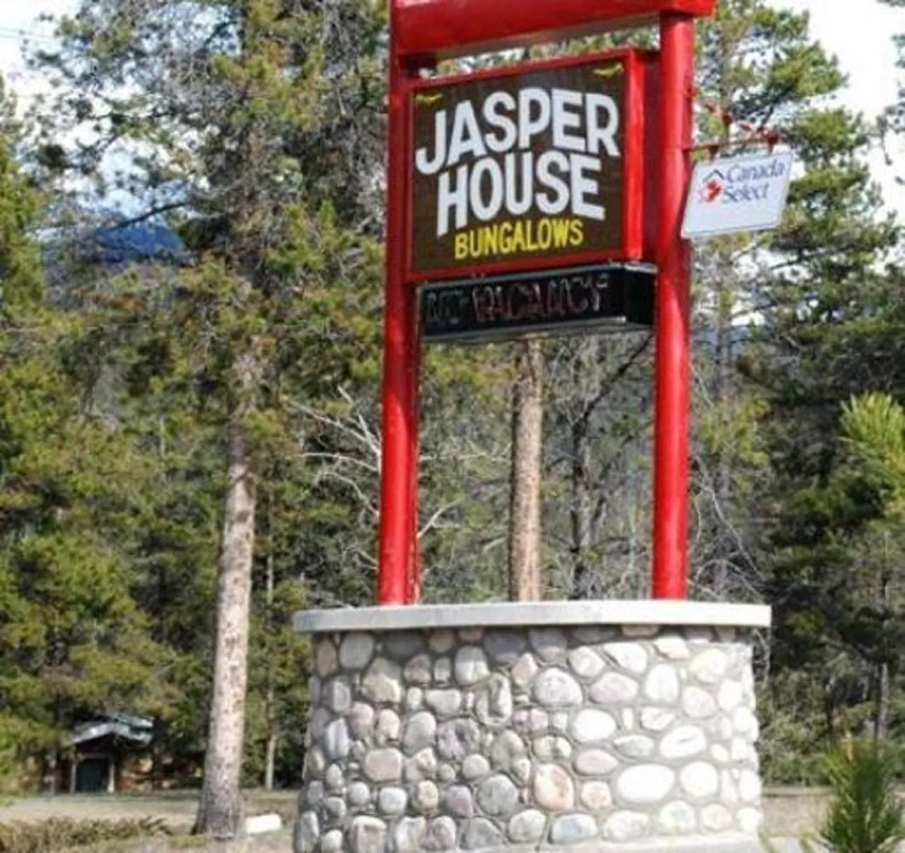 Property logo or sign in Jasper House Bungalows
