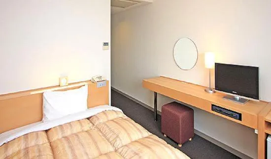 Photo of the whole room, Bed in Okura Hotel Marugame