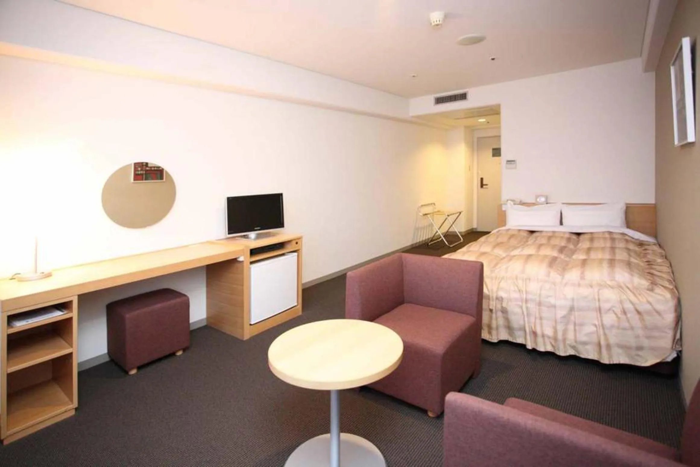 Bed in Okura Hotel Marugame