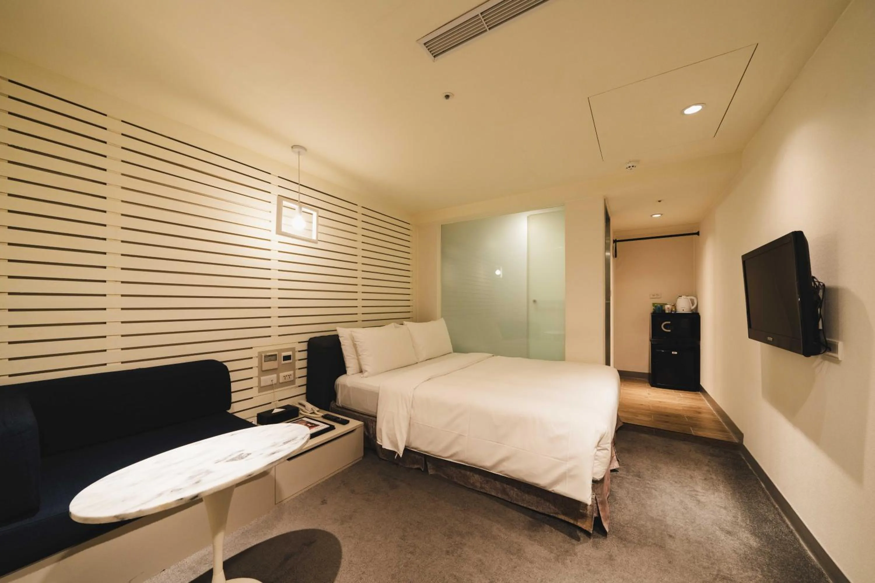 Photo of the whole room, Bed in SWIIO Hotel Ximending