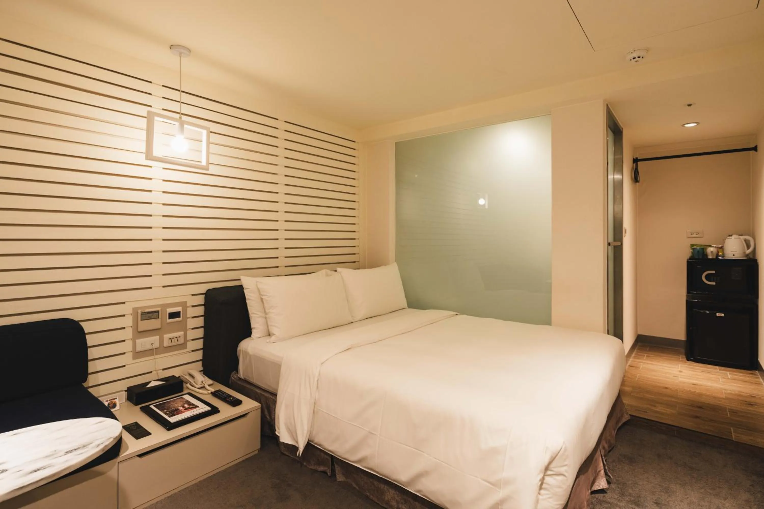 Photo of the whole room, Bed in SWIIO Hotel Ximending