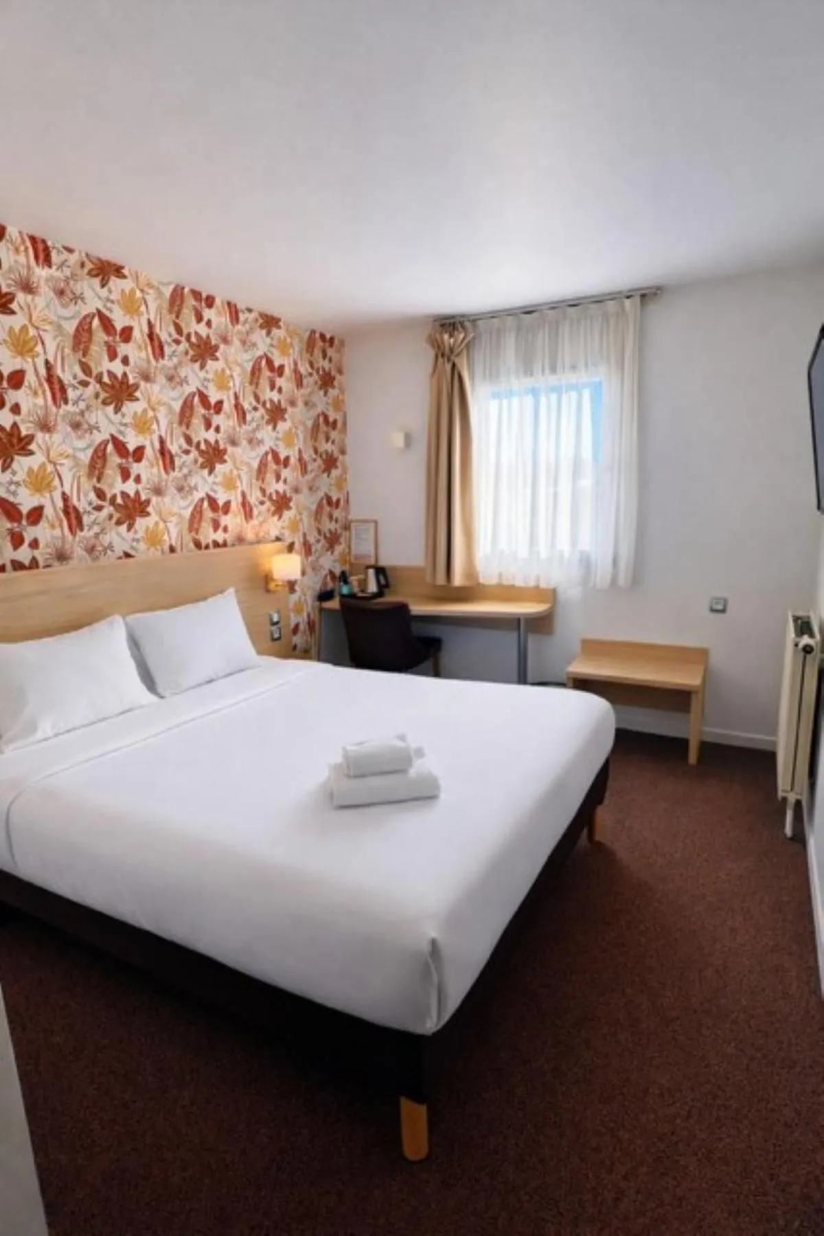 Bed in Logis Hotel Altina