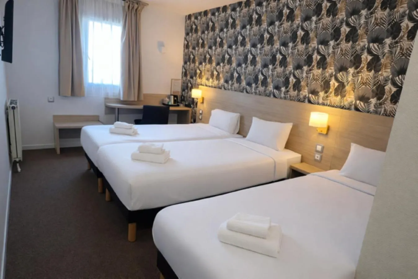 Bed in Logis Hotel Altina