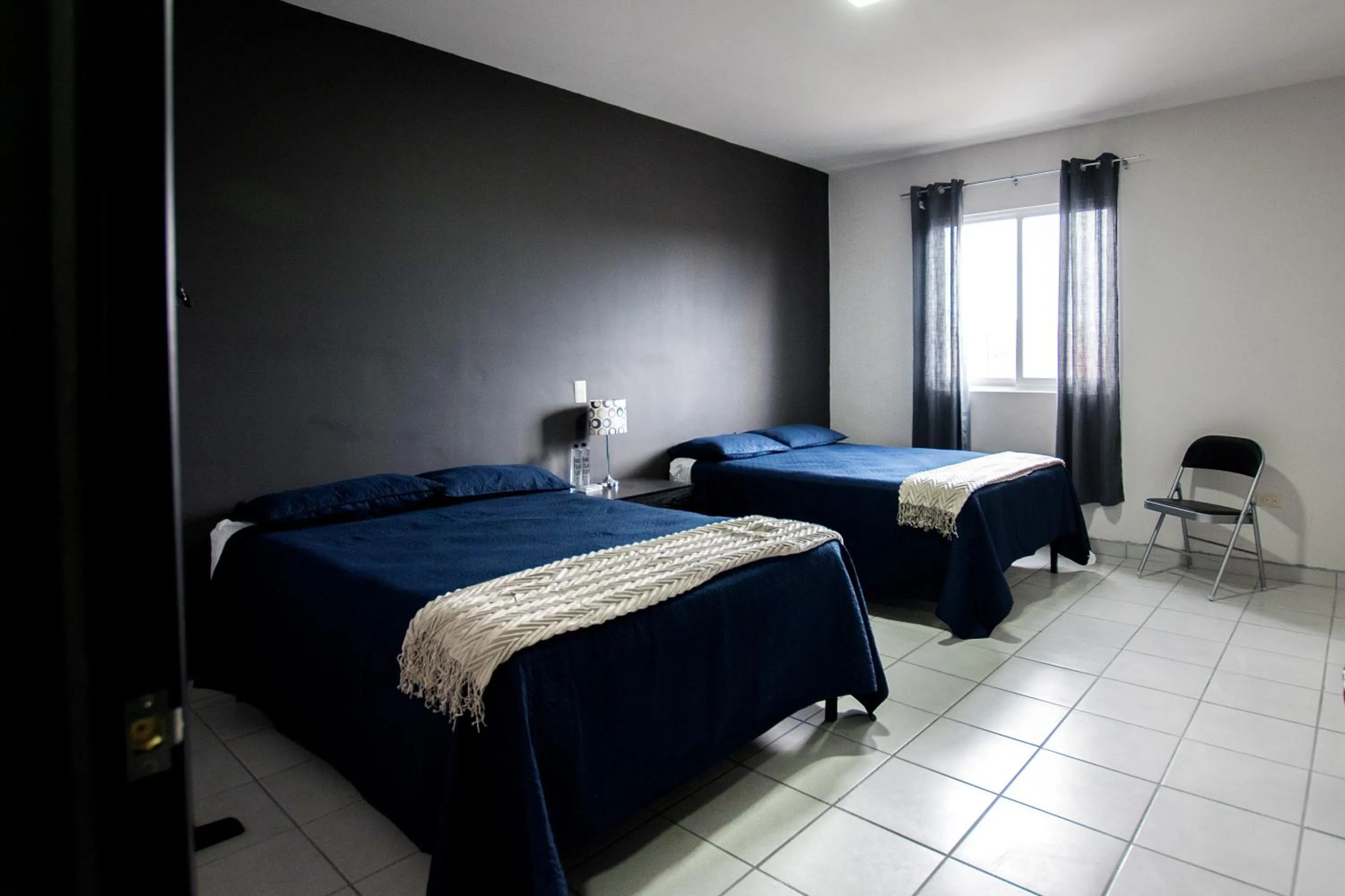 Bed in Hotel San Luis