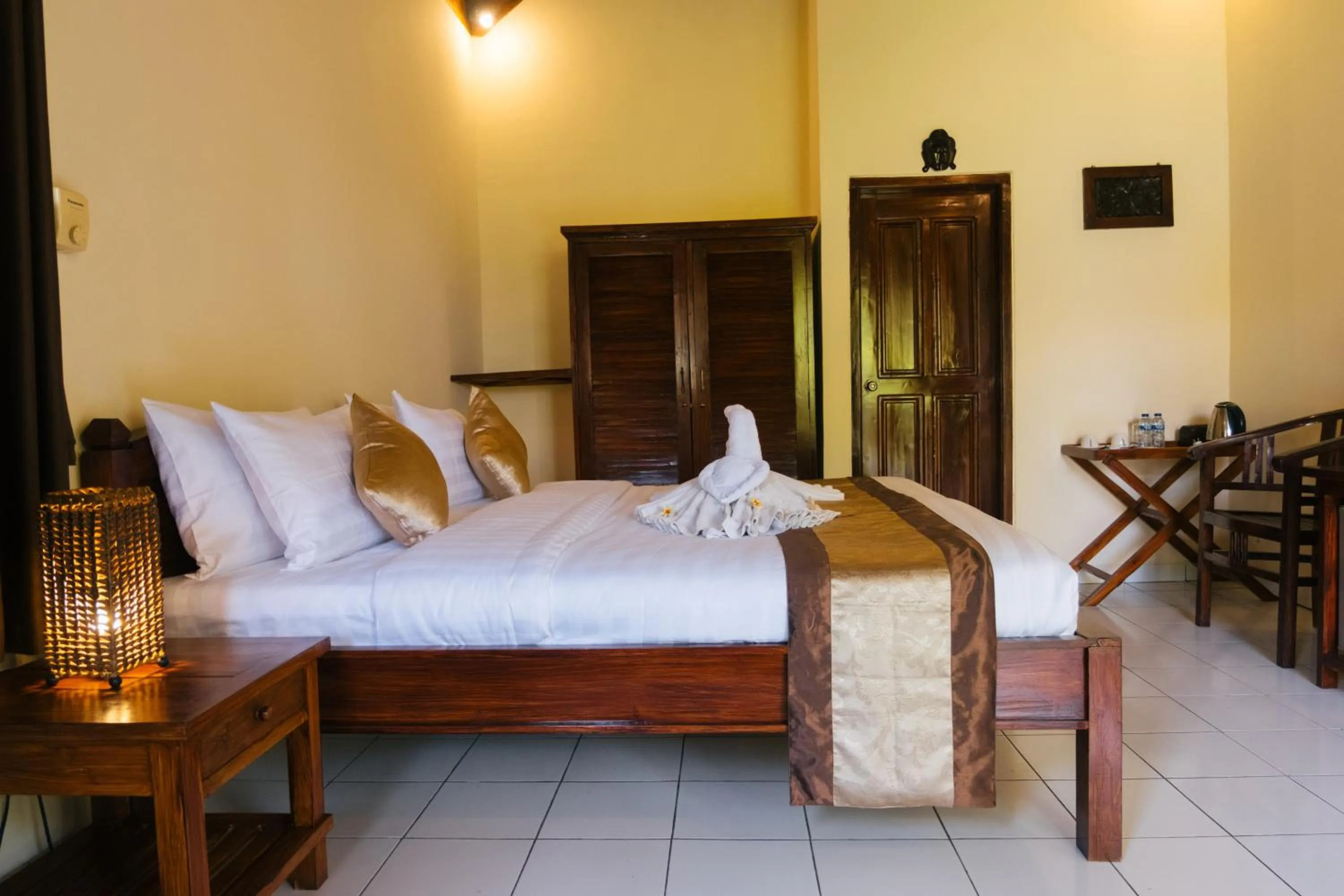 Bed in New Starlight Hotel Lovina