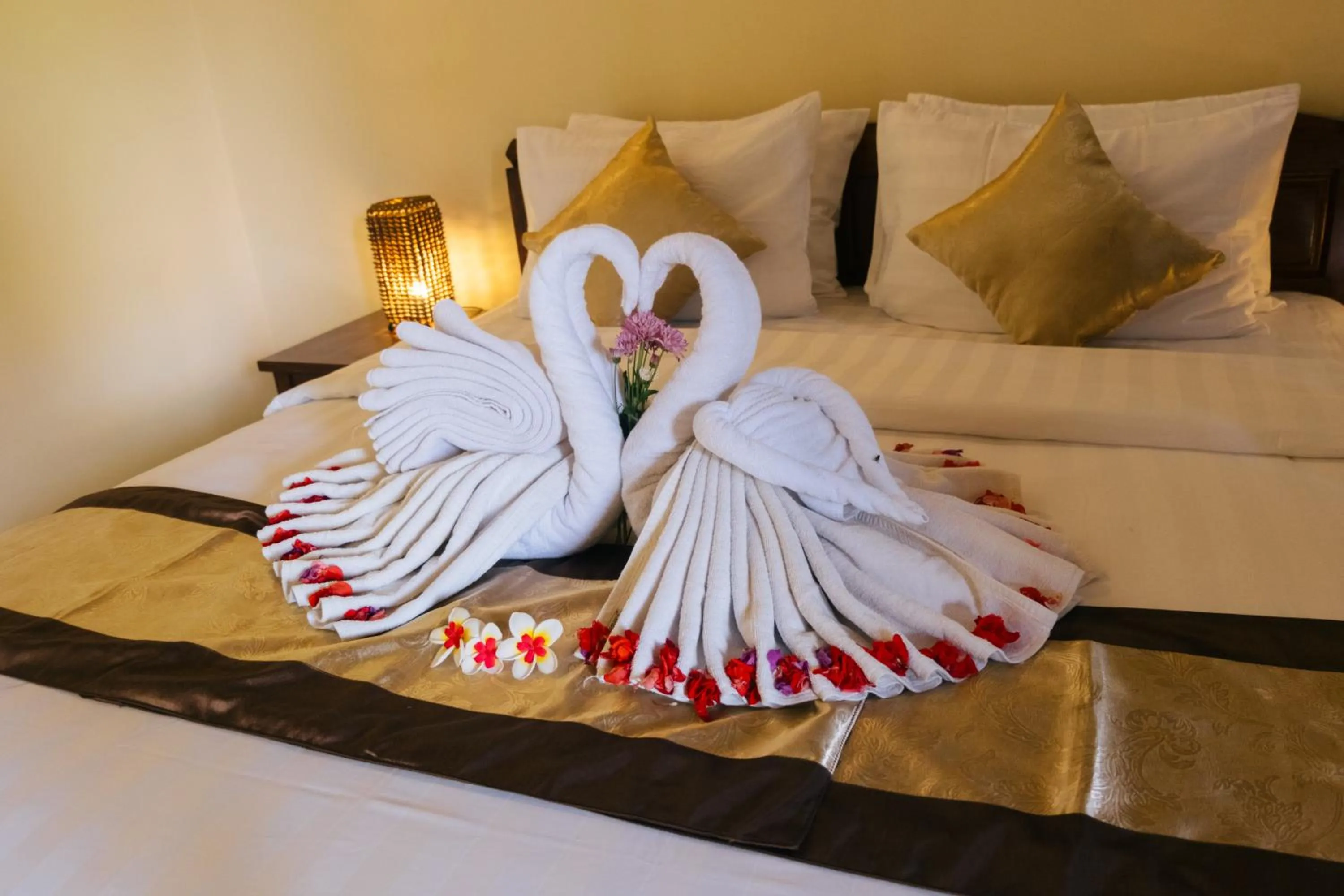 Bed in New Starlight Hotel Lovina