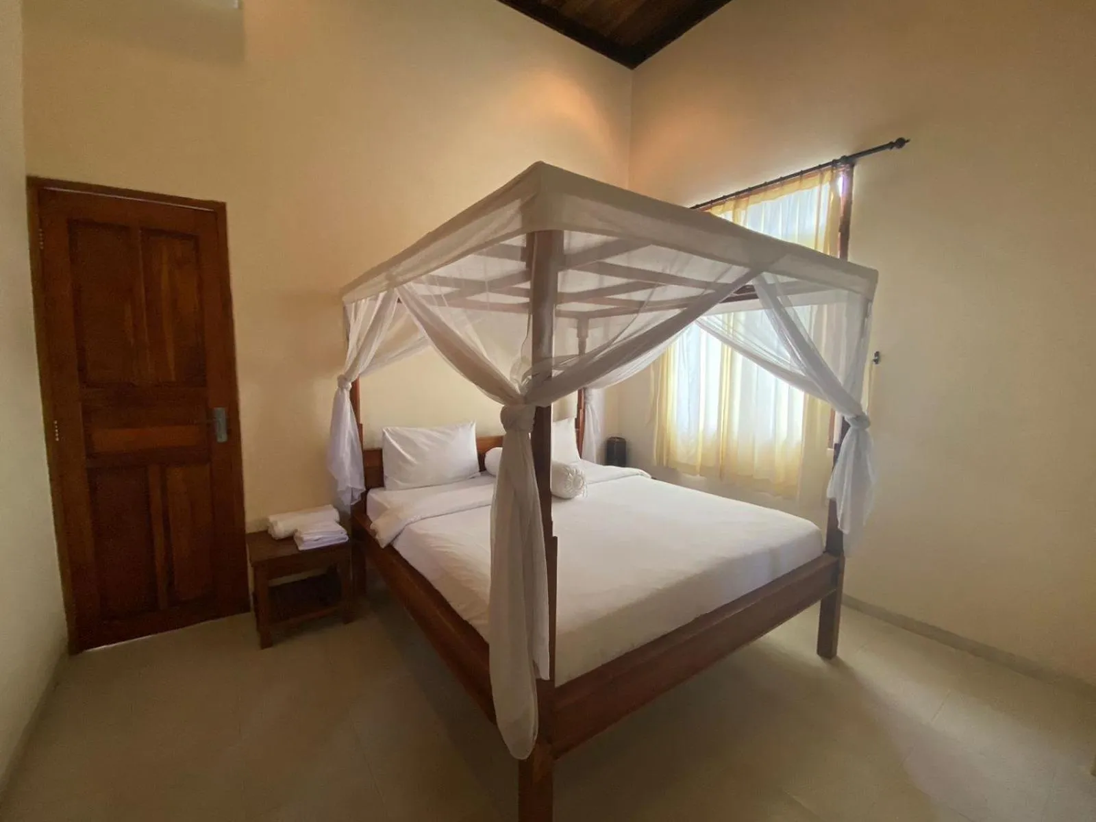 Bed in New Starlight Hotel Lovina