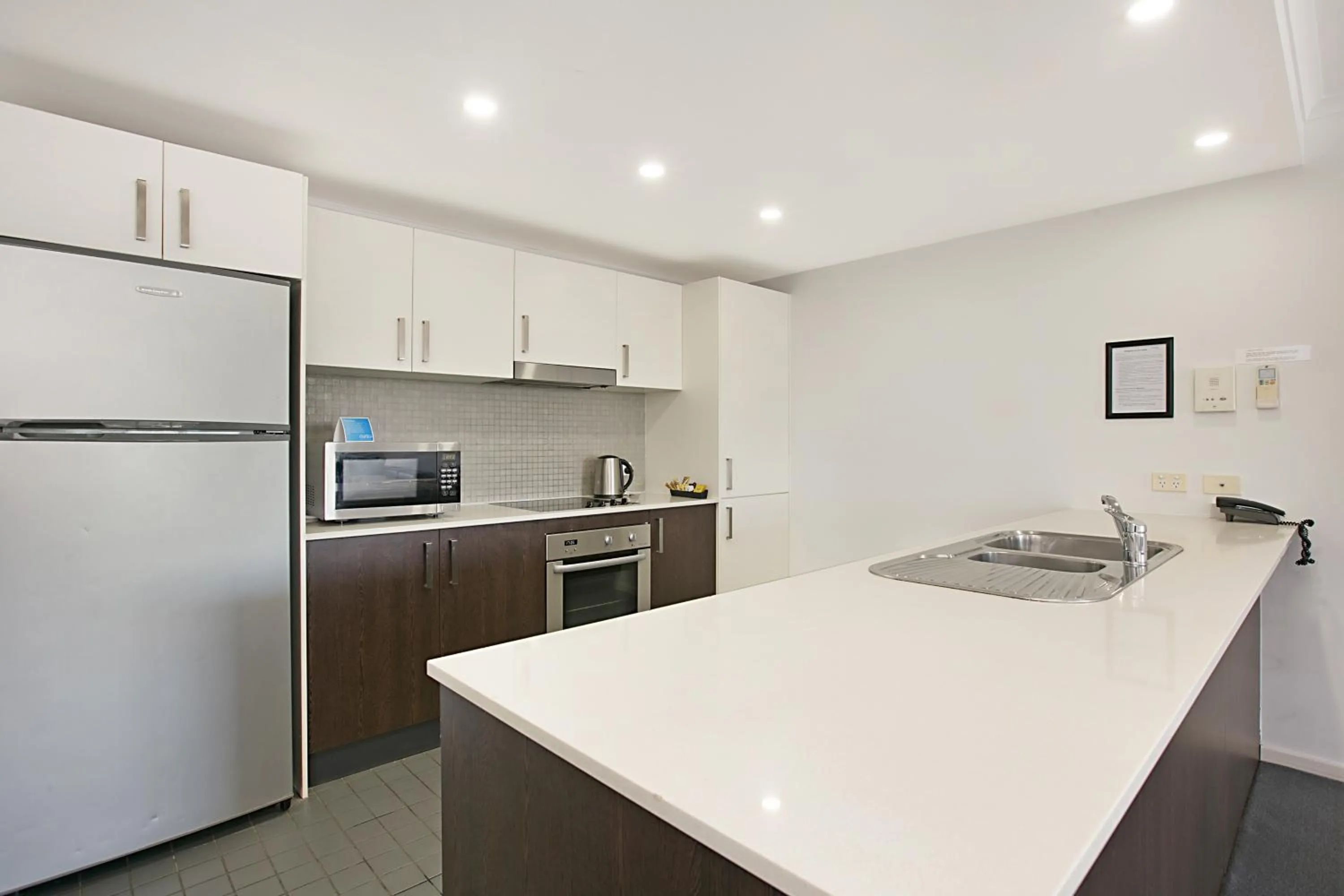 Kitchen or kitchenette in Mantra Nelson Bay