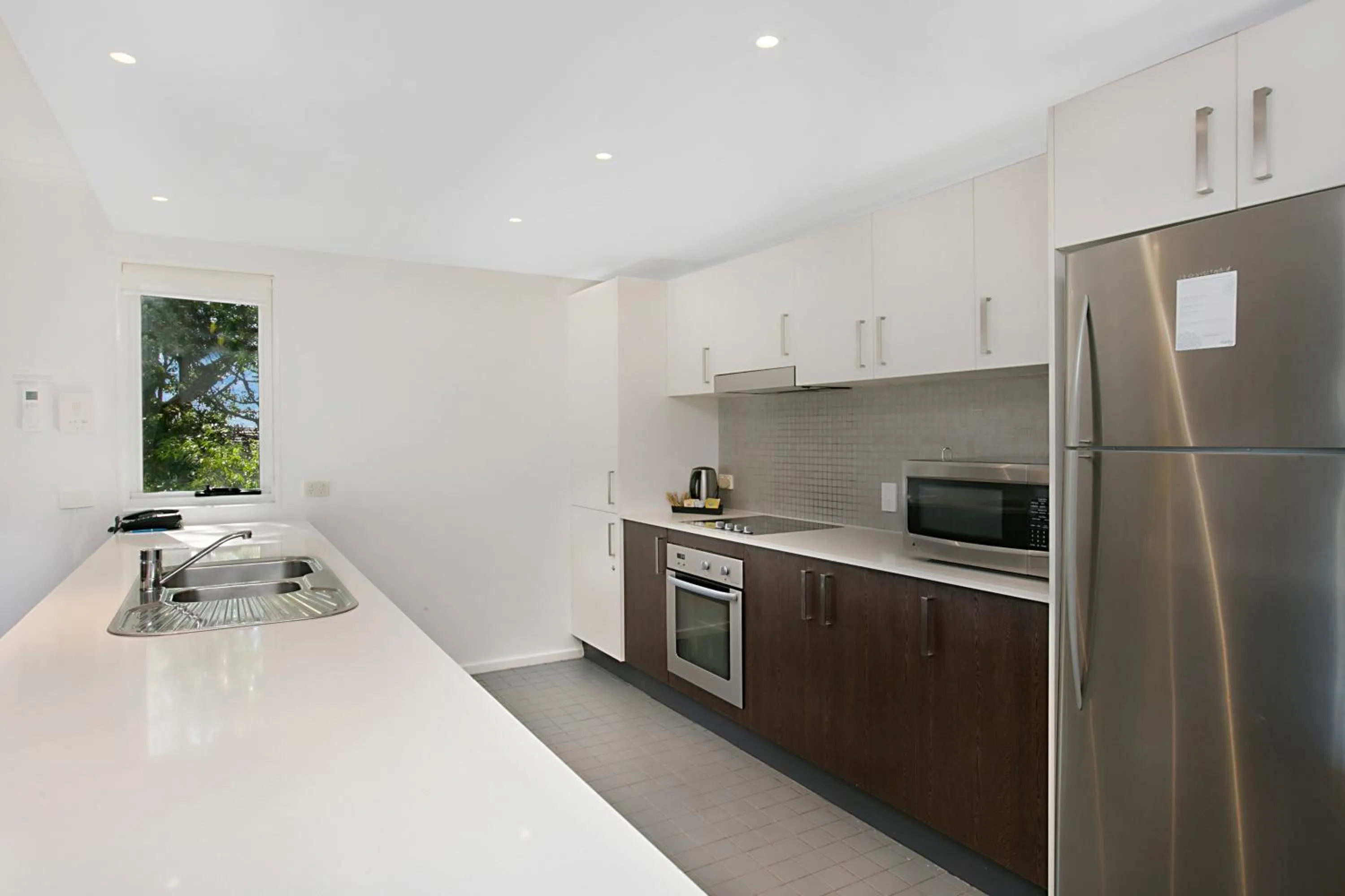 Kitchen or kitchenette in Mantra Nelson Bay