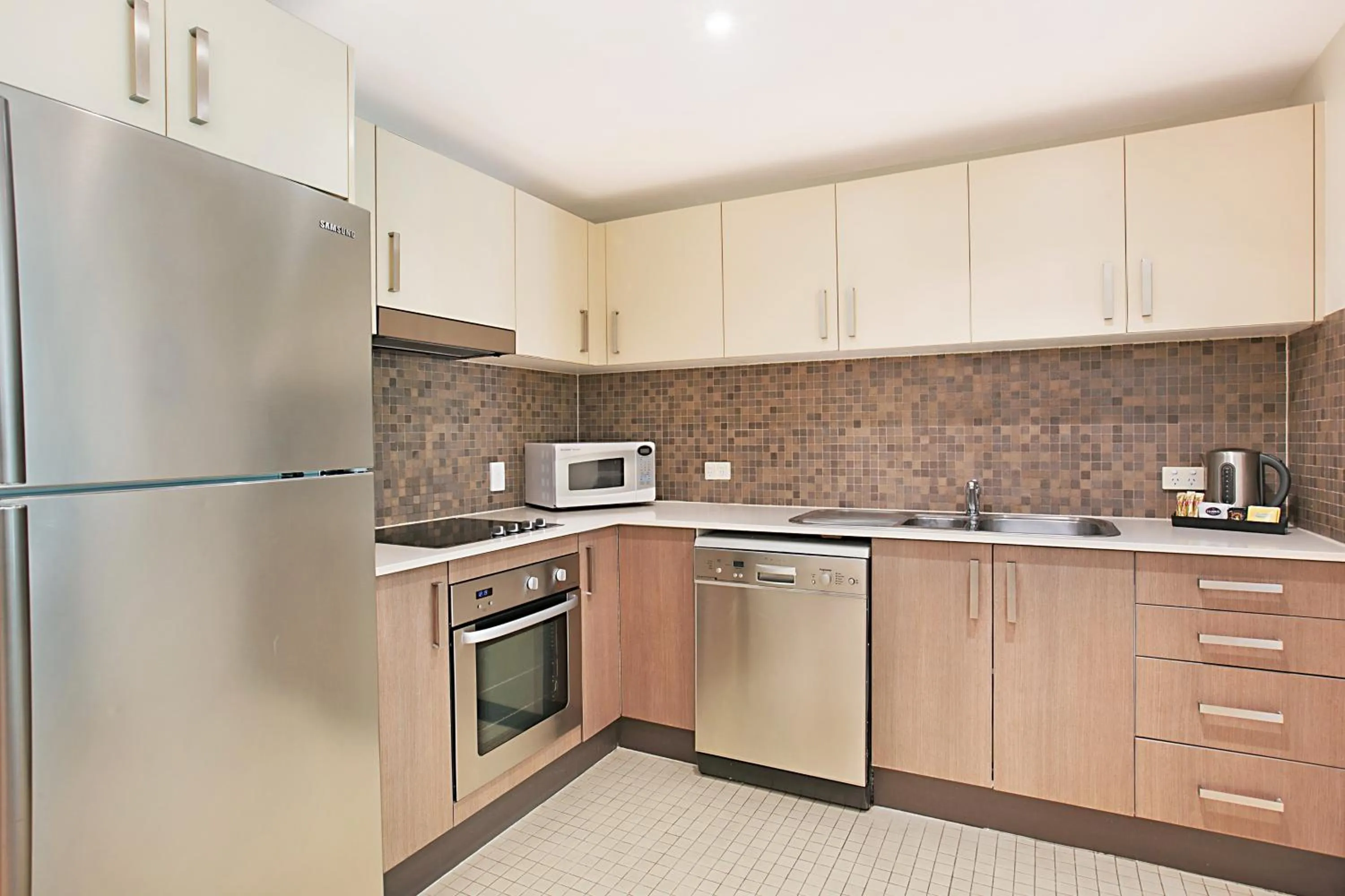Kitchen or kitchenette in Mantra Nelson Bay