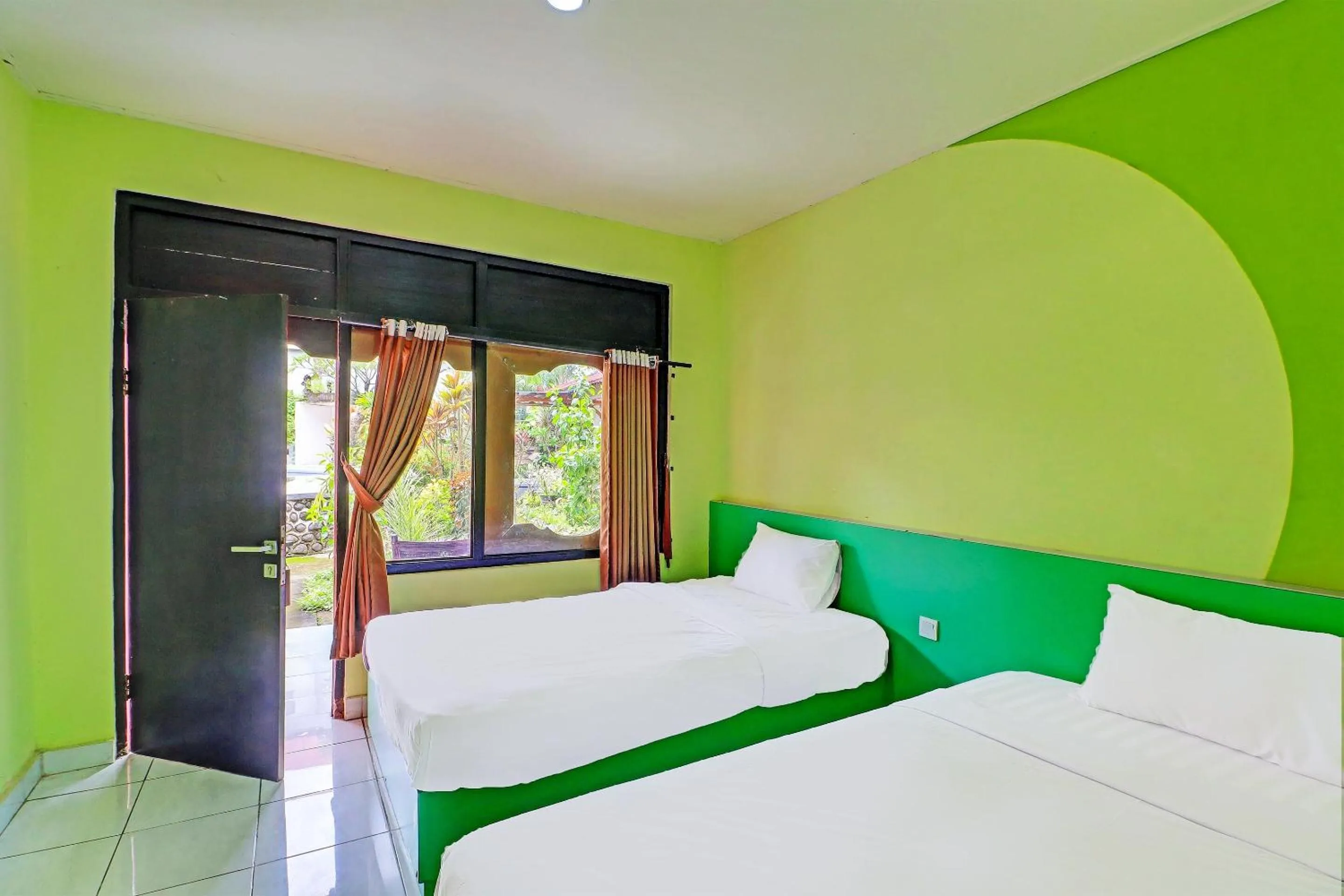 Bedroom in SUPER OYO 91870 Warna Kedaton
