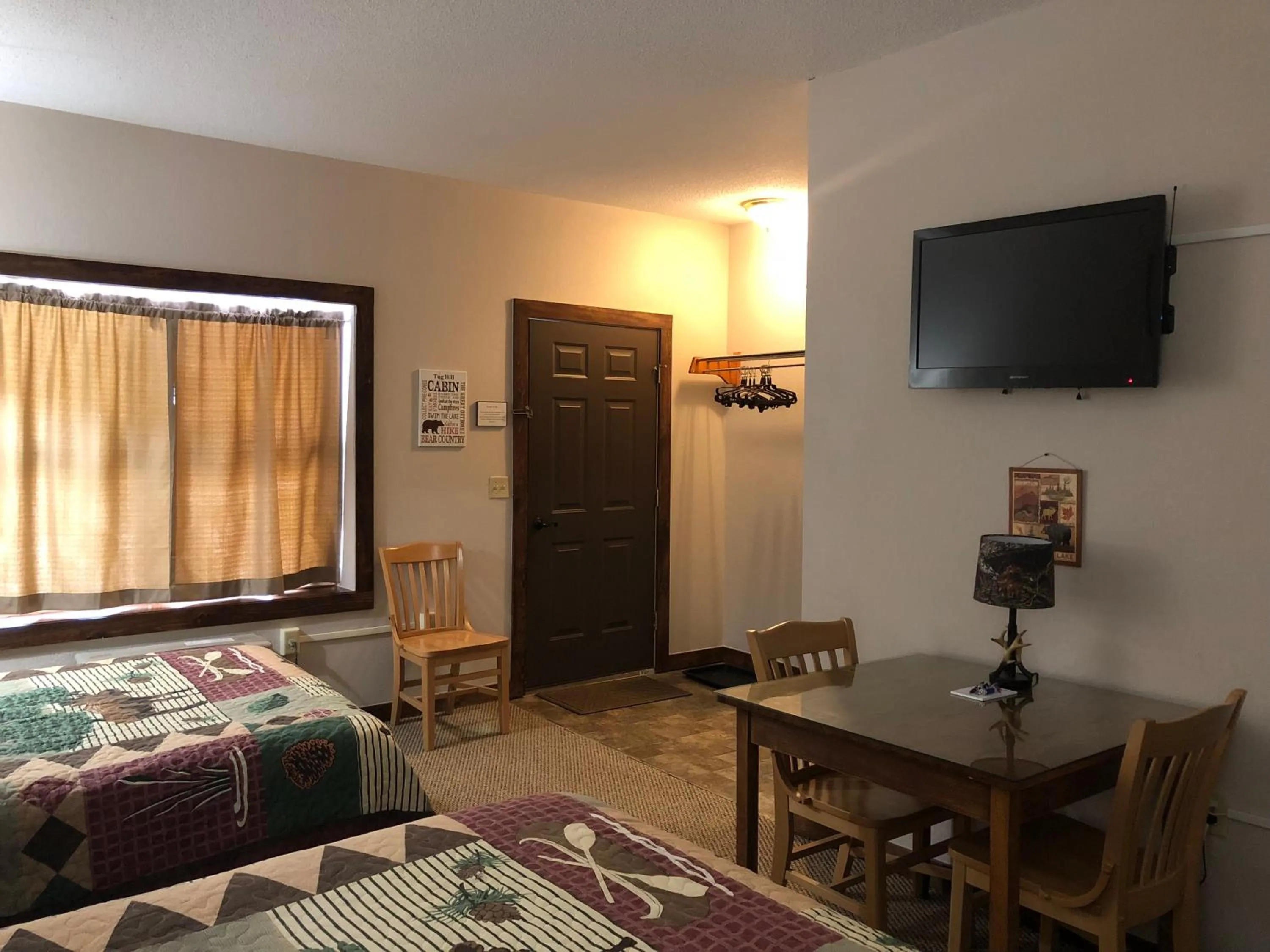 Photo of the whole room, Bed in Tug Hill Resort