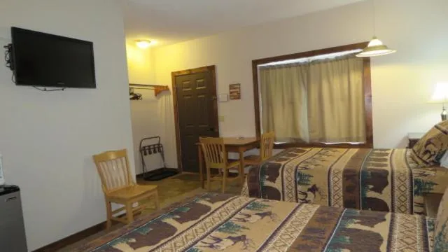 Photo of the whole room, Bed in Tug Hill Resort