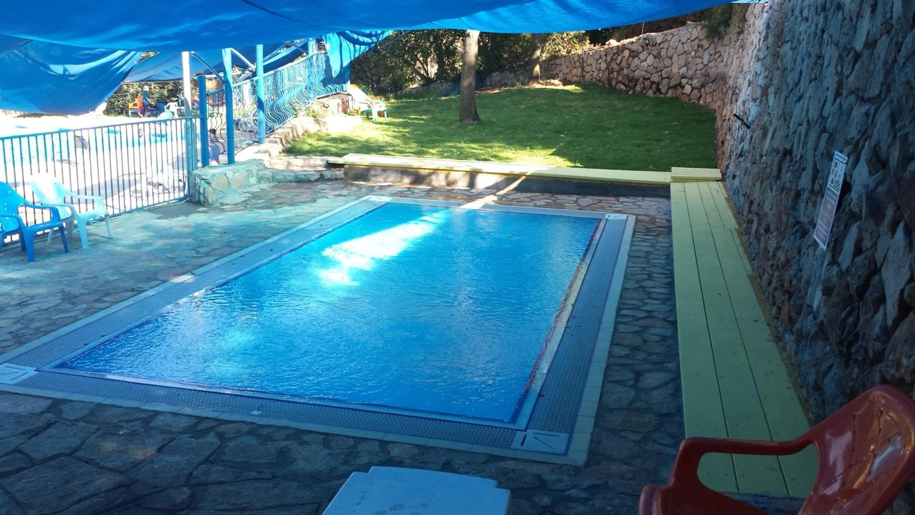 Swimming pool in Ohn-Bar Guesthouse