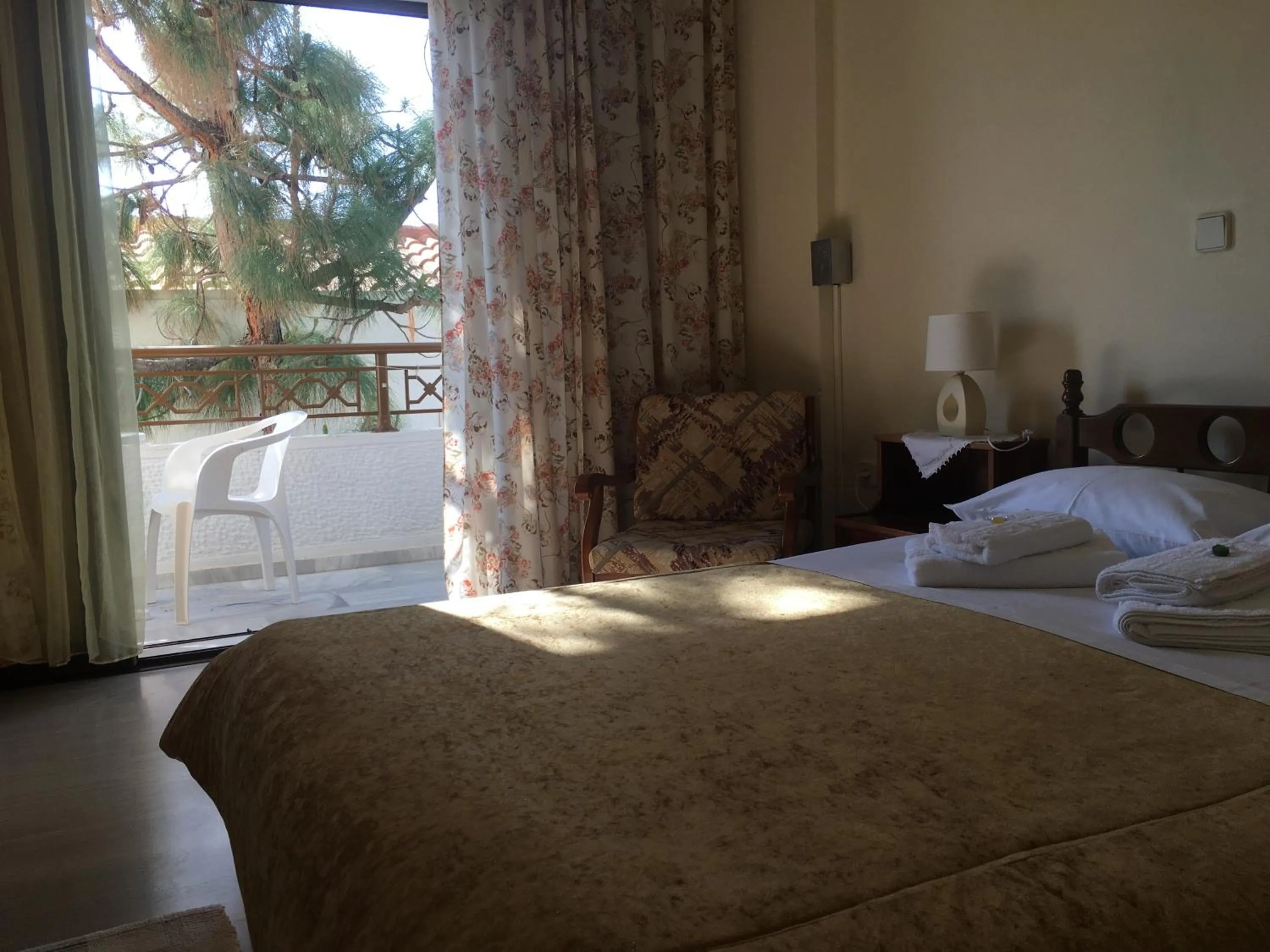 Bedroom in Chris Studios & Apartments