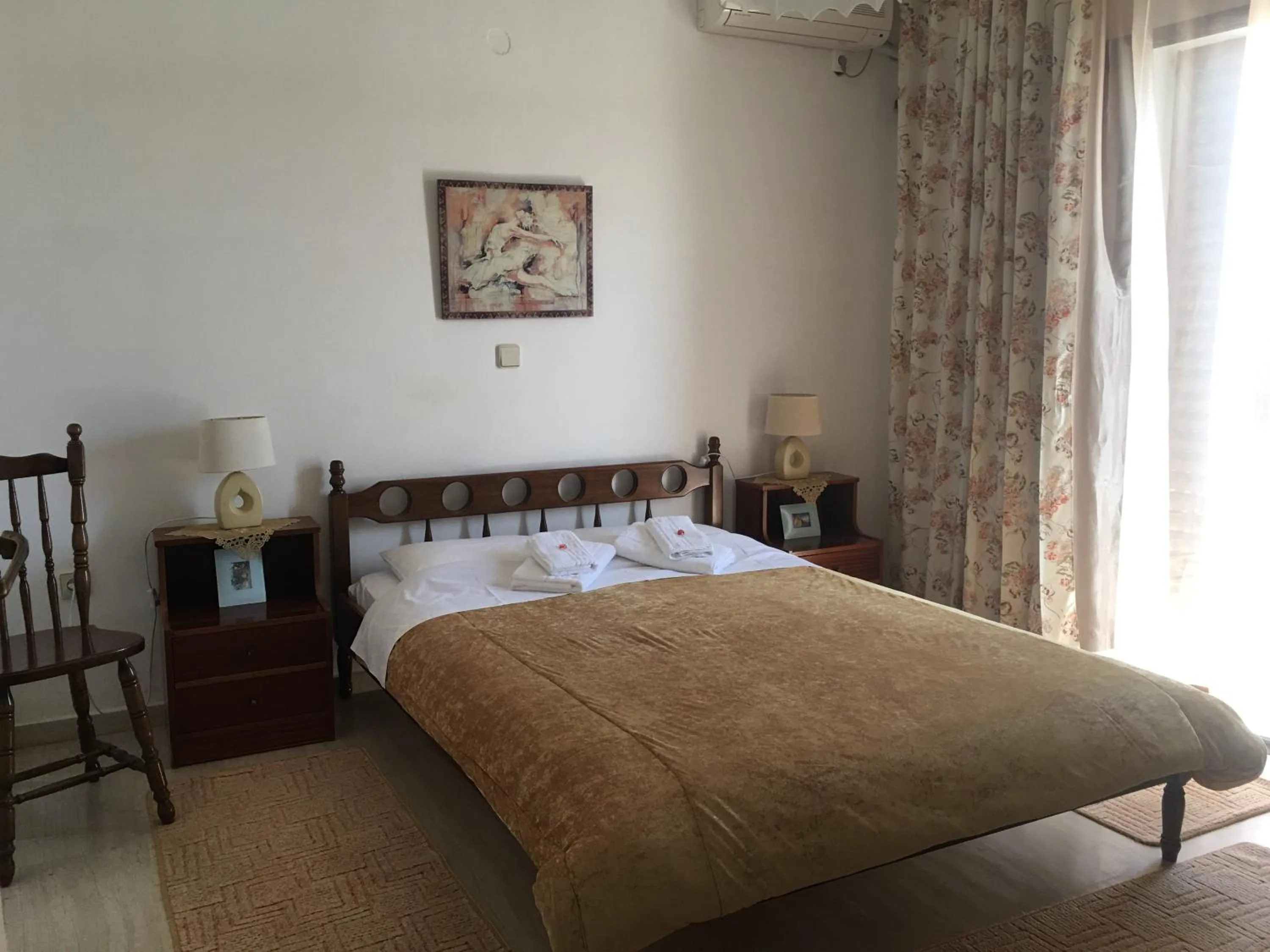 Bedroom in Chris Studios & Apartments