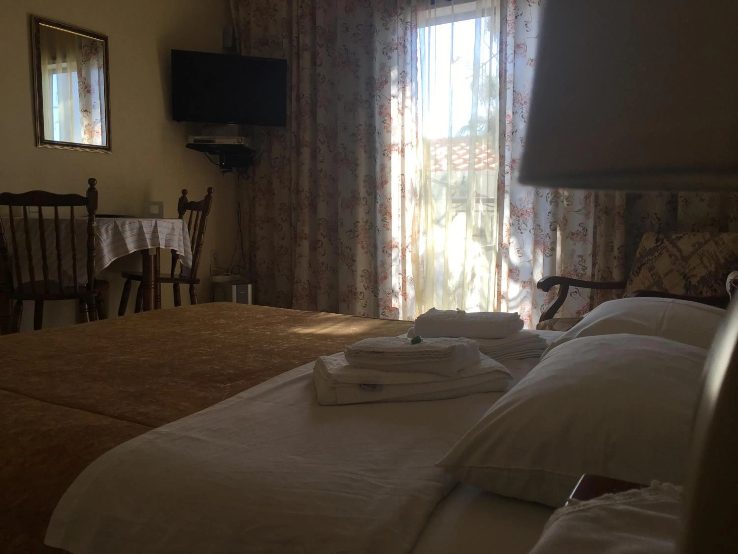 Bedroom in Chris Studios & Apartments