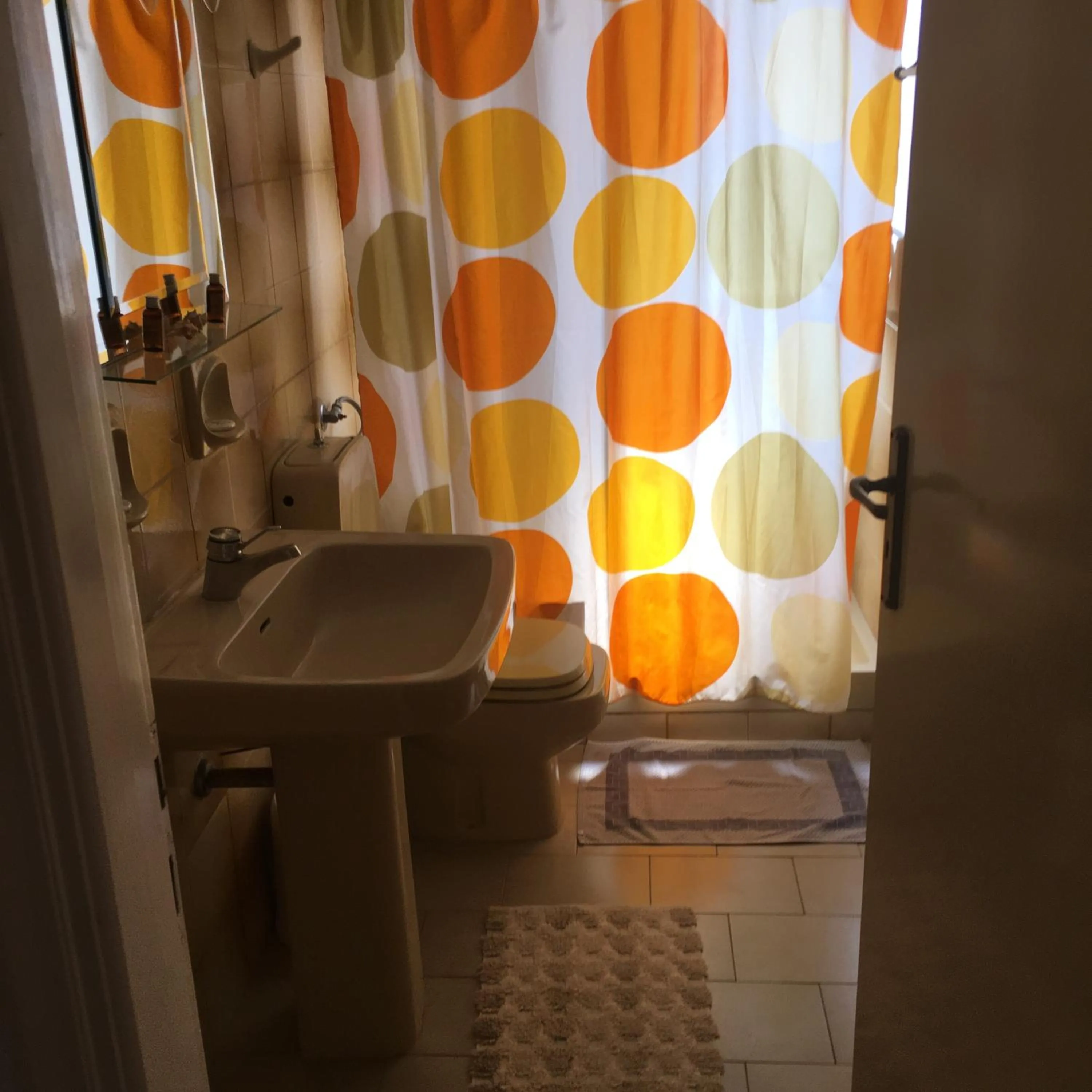 Toilet in Chris Studios & Apartments