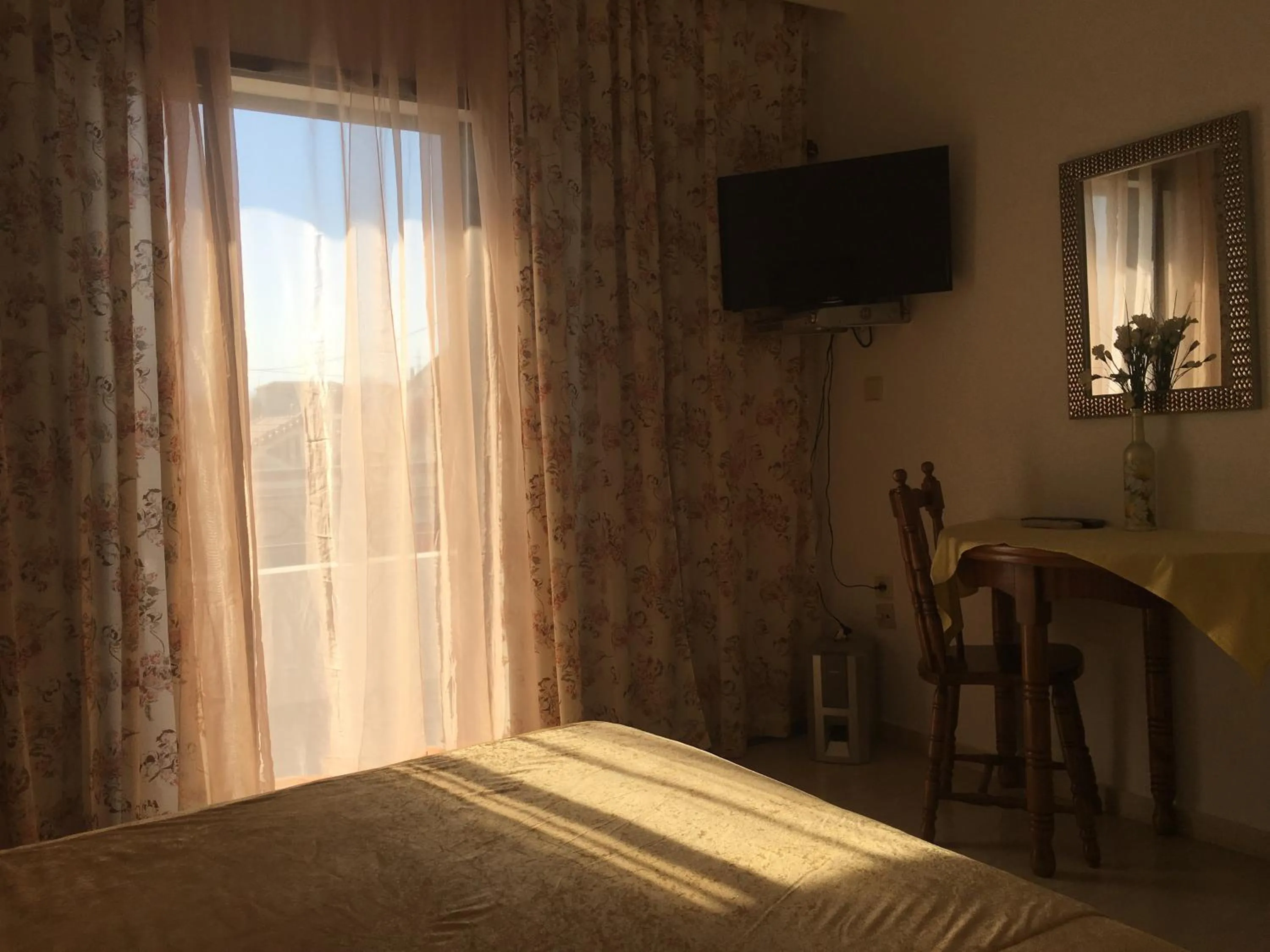 Bedroom in Chris Studios & Apartments